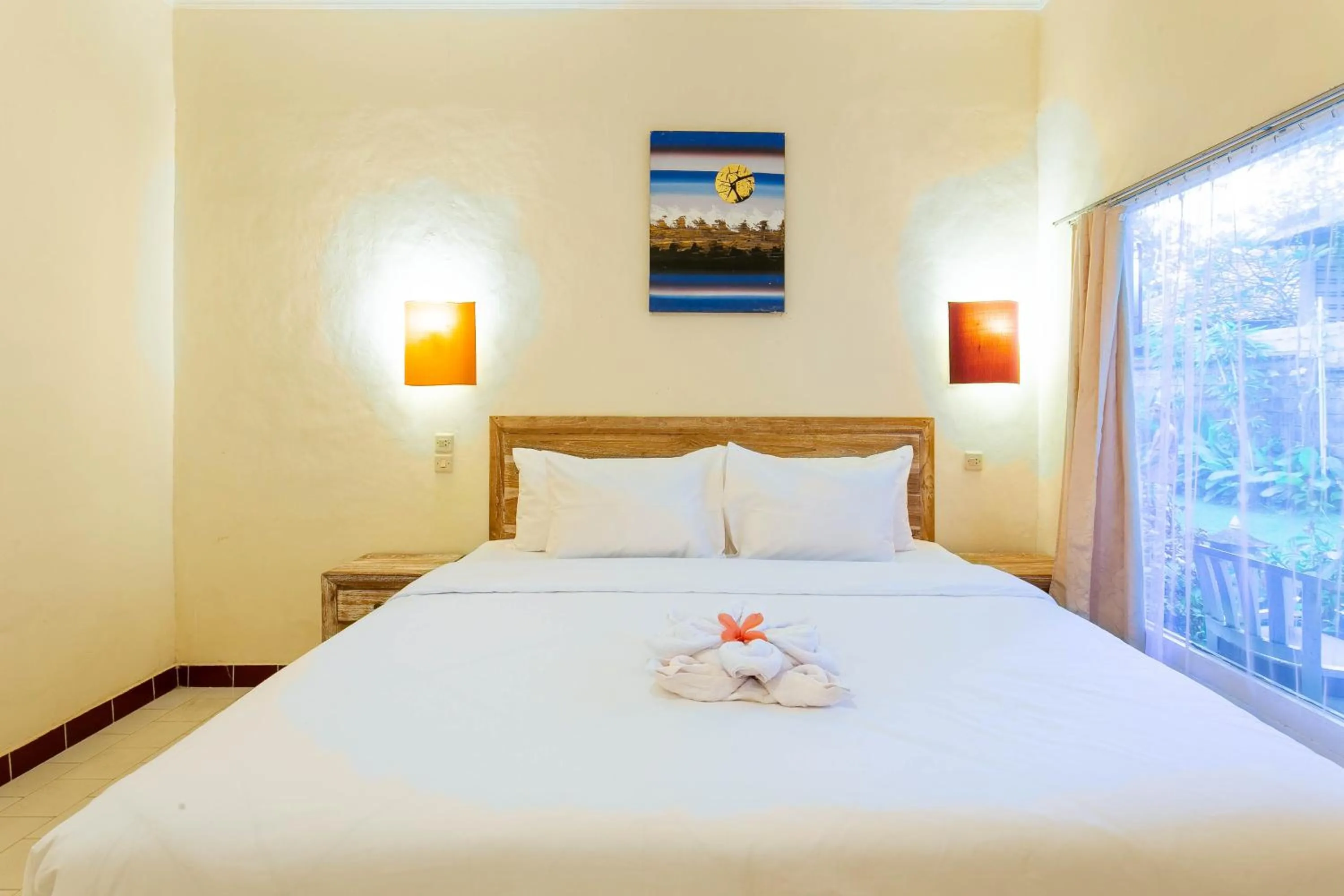 Bed in Utama Villas Beach Front Candidasa