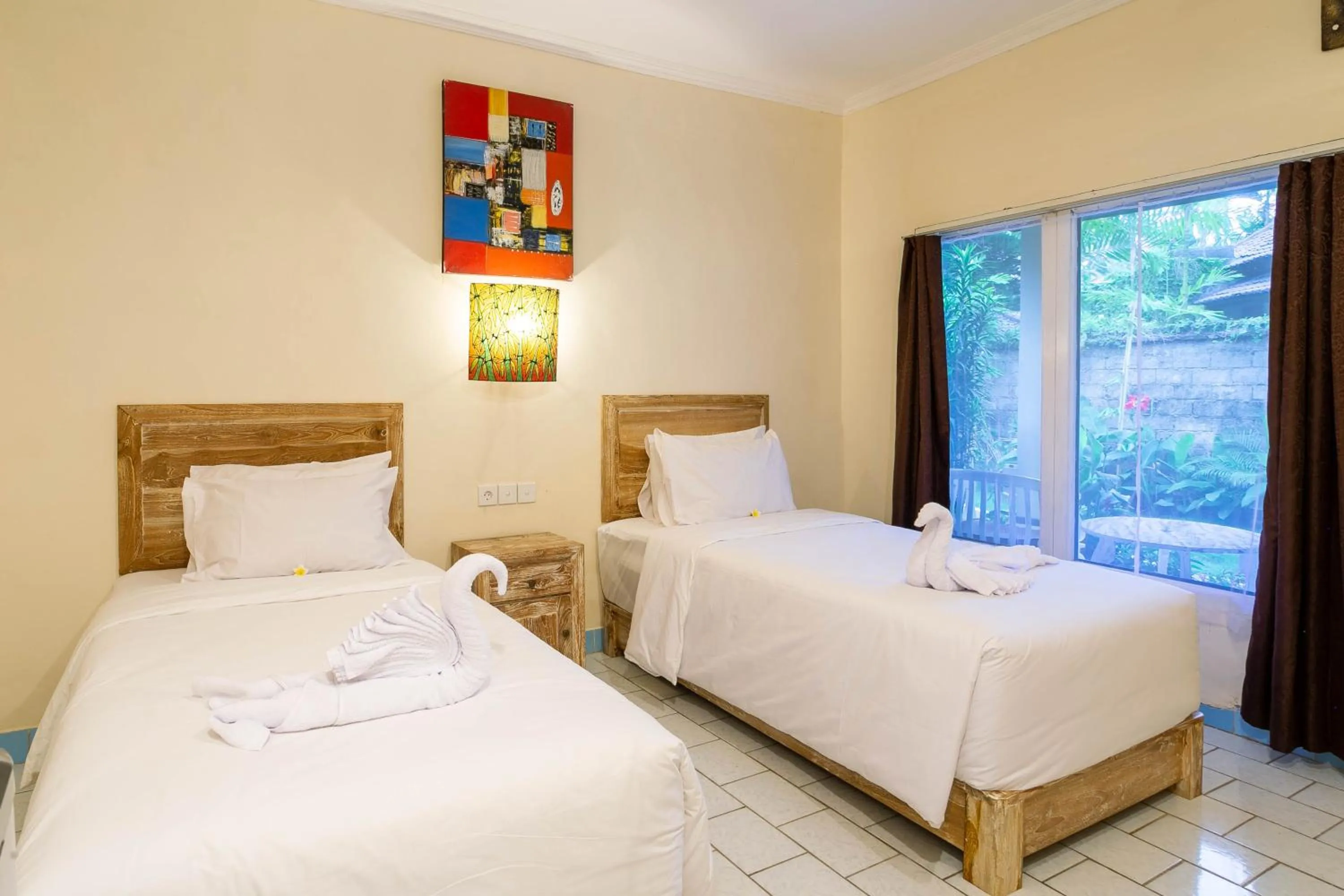 Bed in Utama Villas Beach Front Candidasa