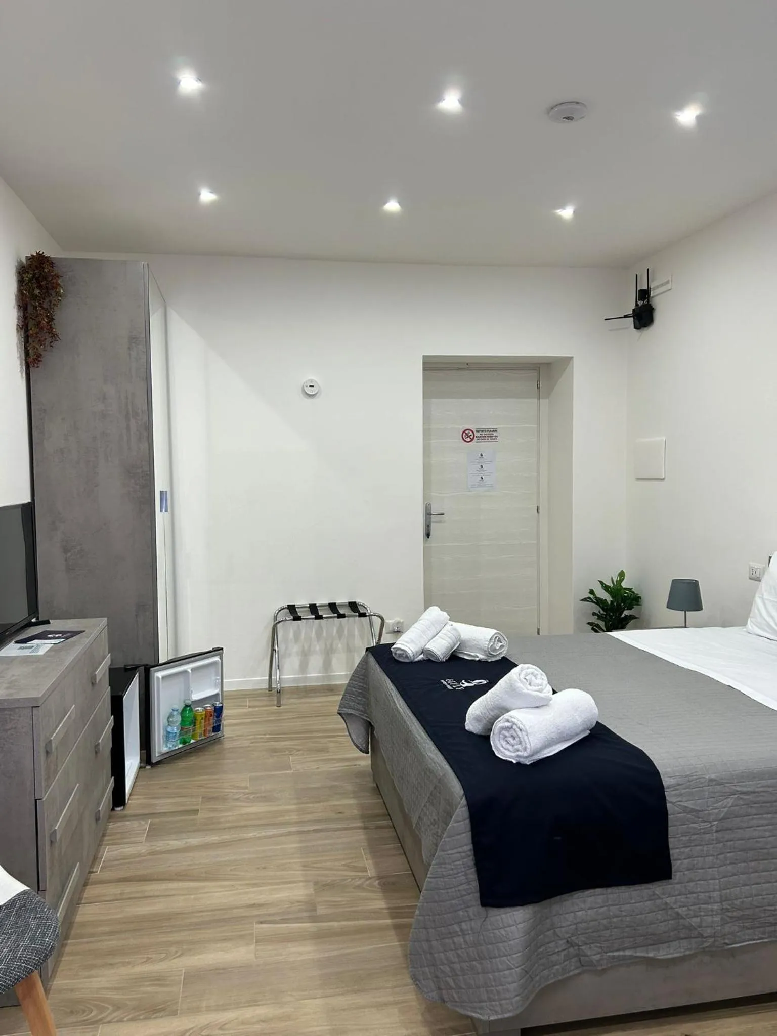 Bed in GIULY SUITES & ROOMS