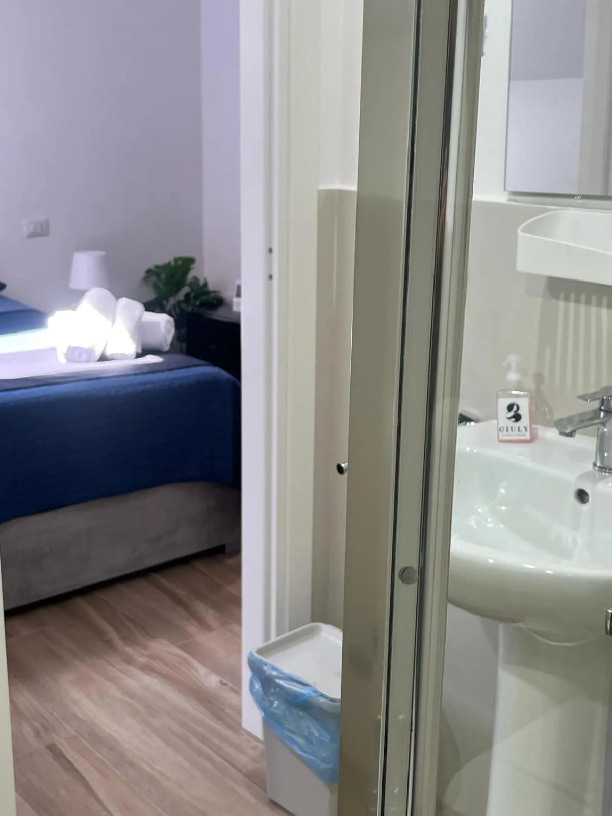 Bed in GIULY SUITES & ROOMS