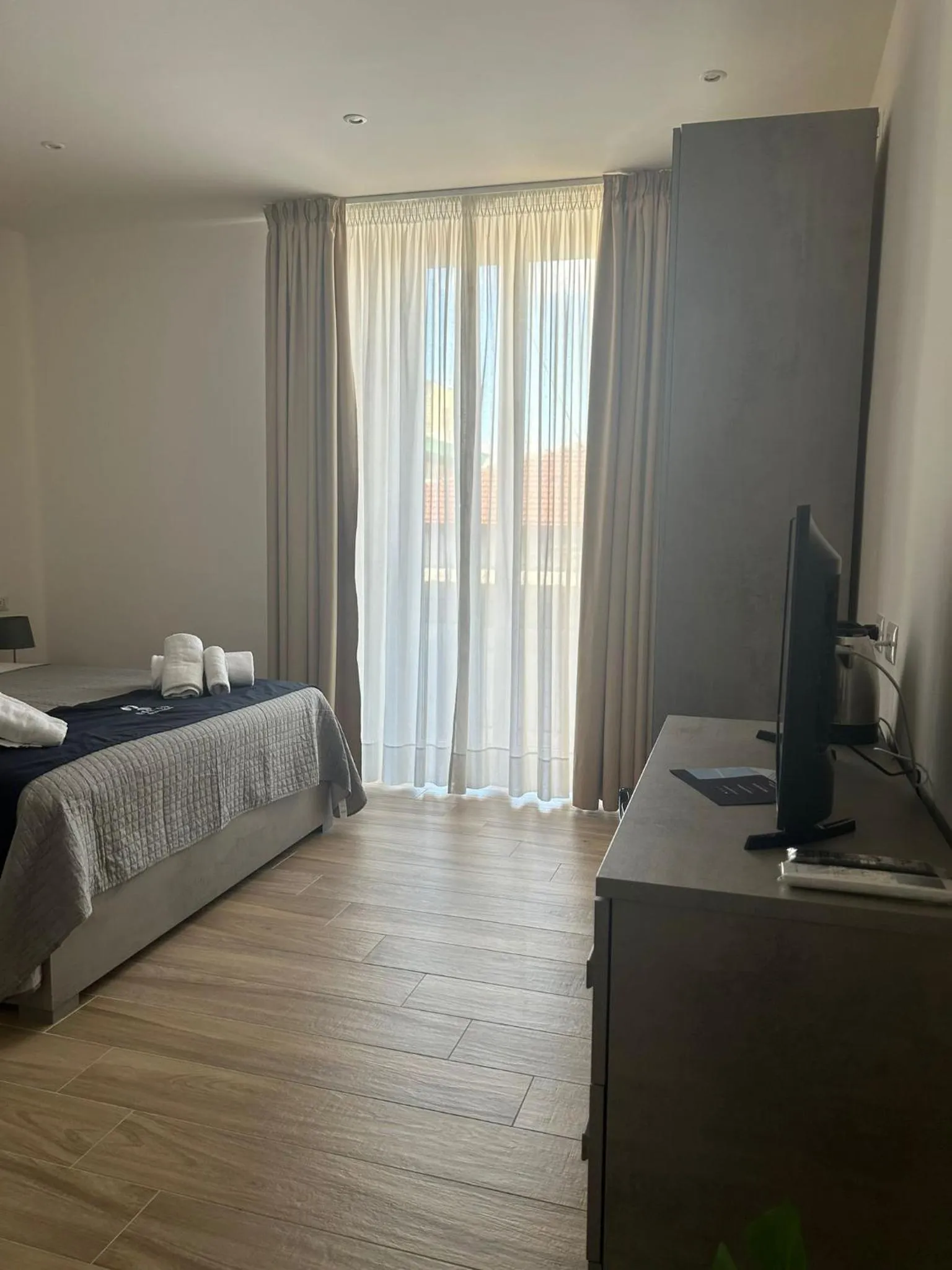 Bed in GIULY SUITES & ROOMS