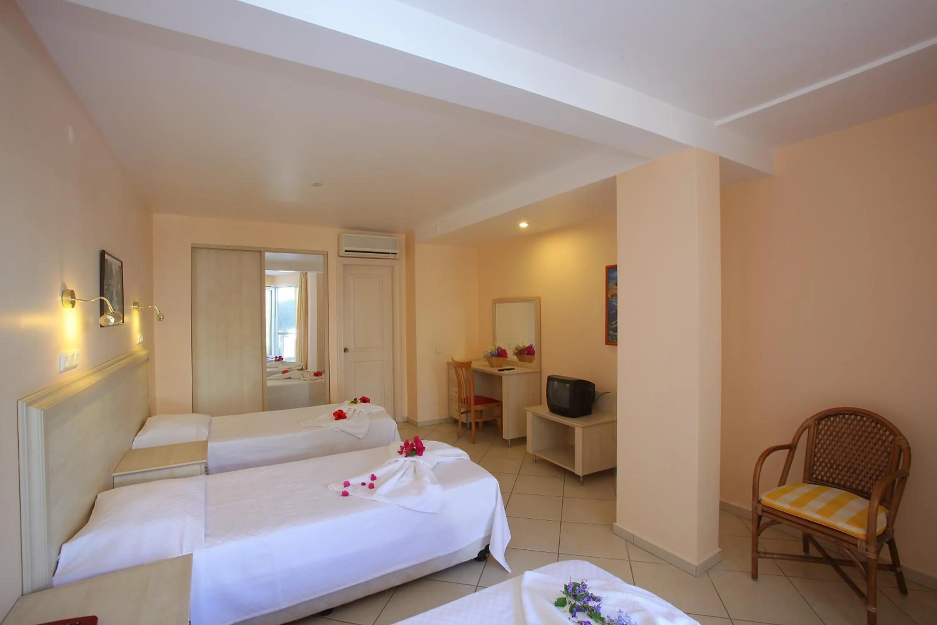 Bed in Catamaran Hotel