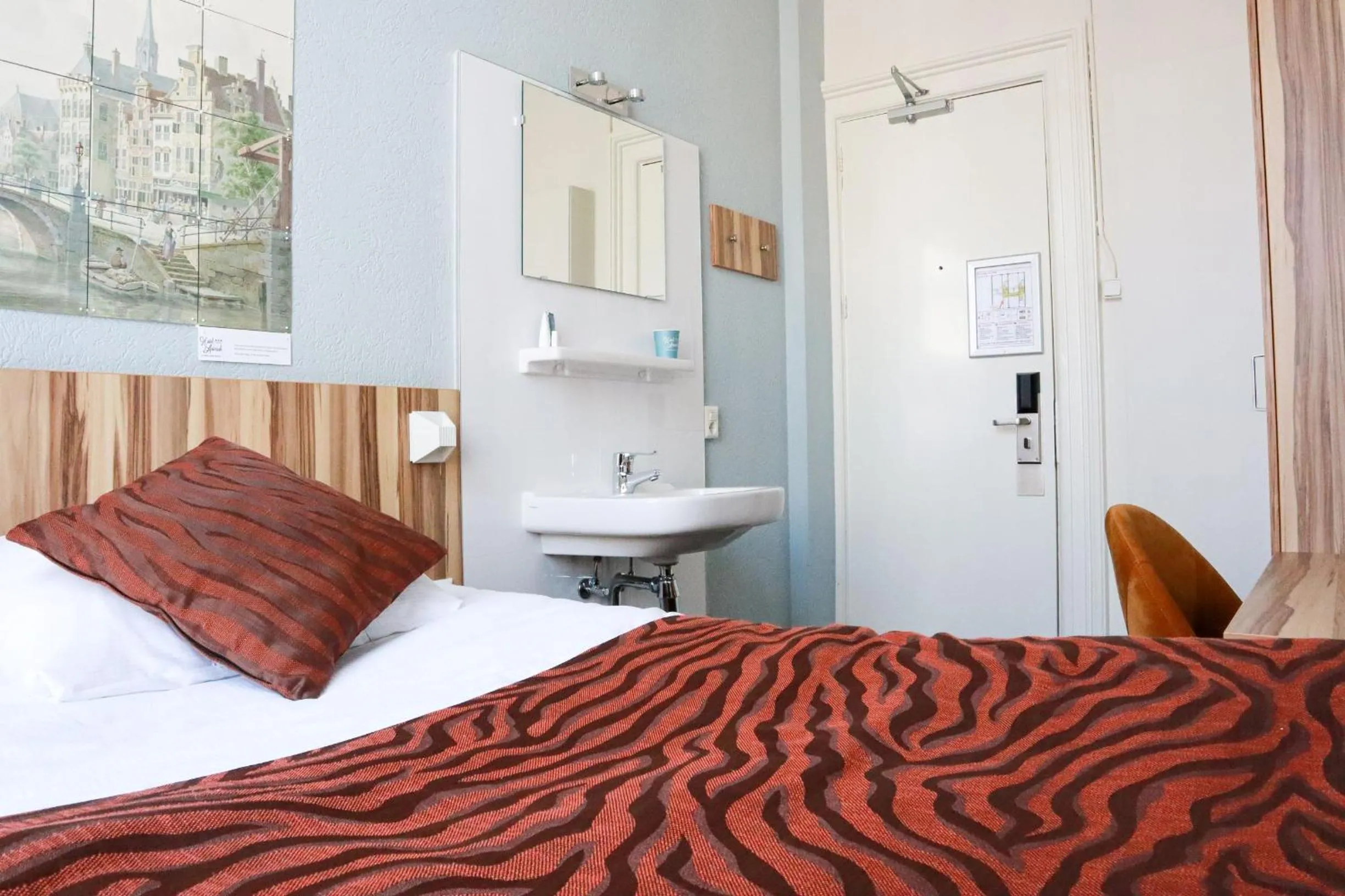 Property building, Bed in Hotel Asterisk, a family run hotel