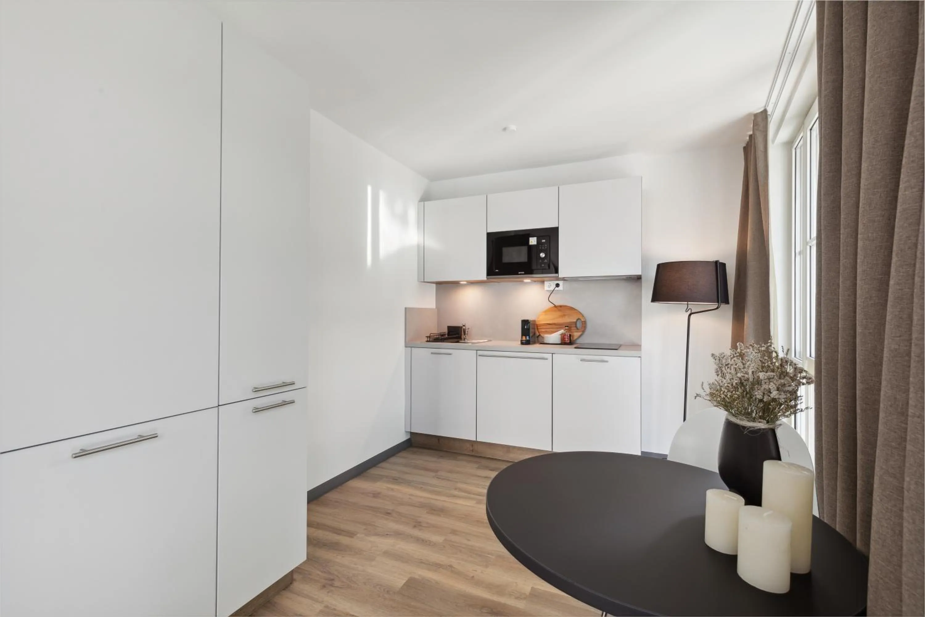 Kitchen or kitchenette in Home and CoLiving Bonn I Aparthotel