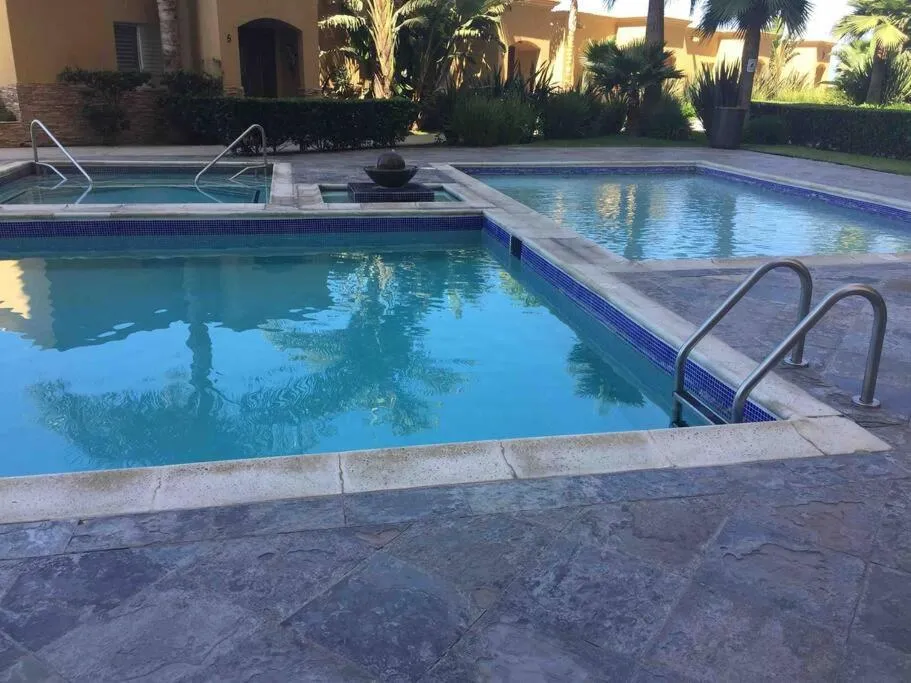 Swimming pool in The Dolphins Ocean Front-Beach 2 BR 2Bth