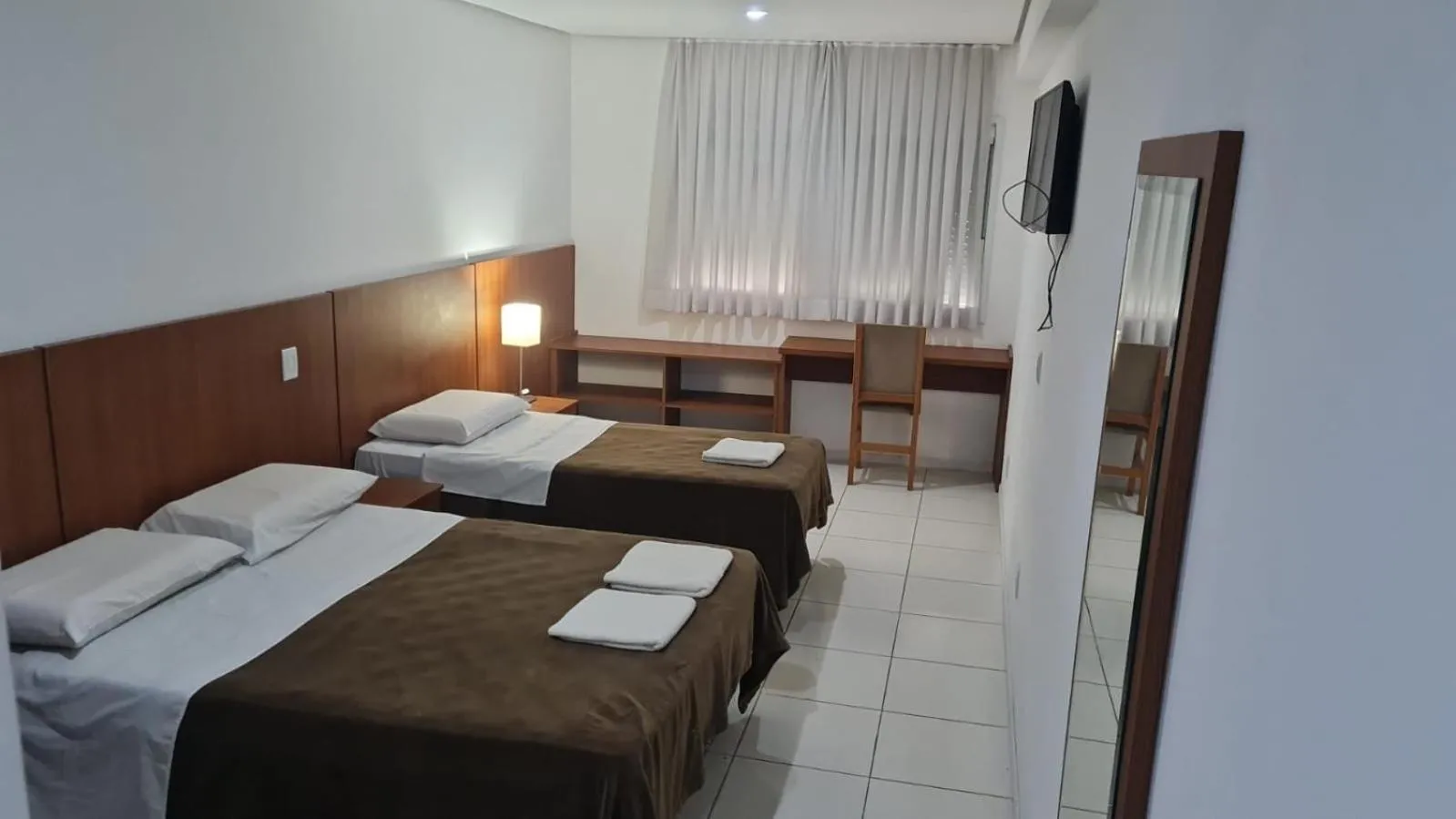 Bedroom, Bed in HOTEL DO CENTRO 100m SANTA CASA, ASSEMBLEIA E UFRGS, PROXIMO AO ARAUJO VIANA, PET'S FRIENDLY!!!
