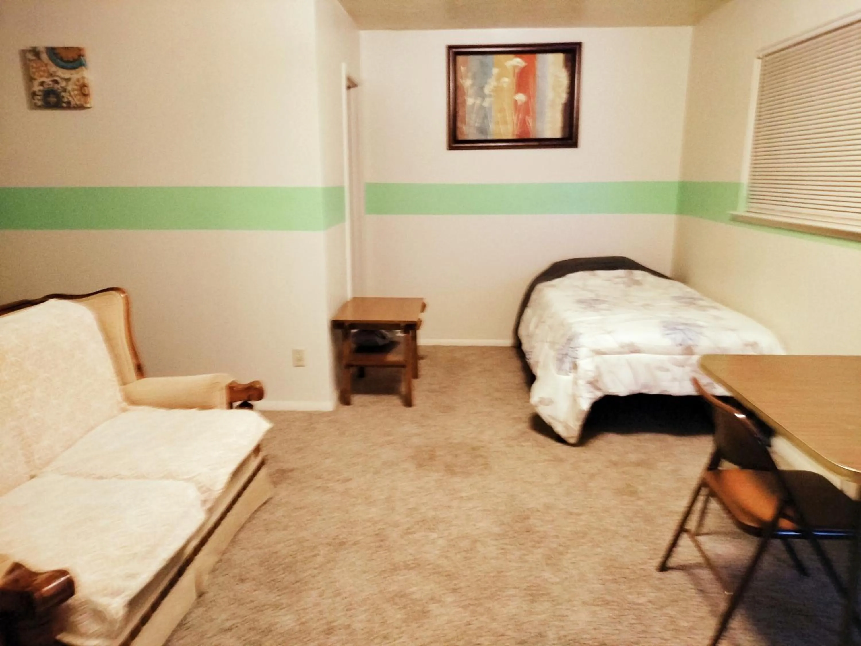 Bed in Golden Sunflower's Apt E