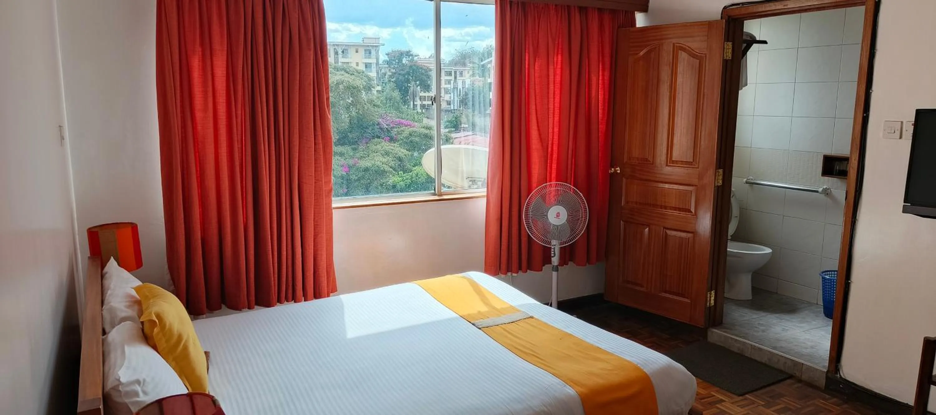 Bed in Kenya Comfort Suites