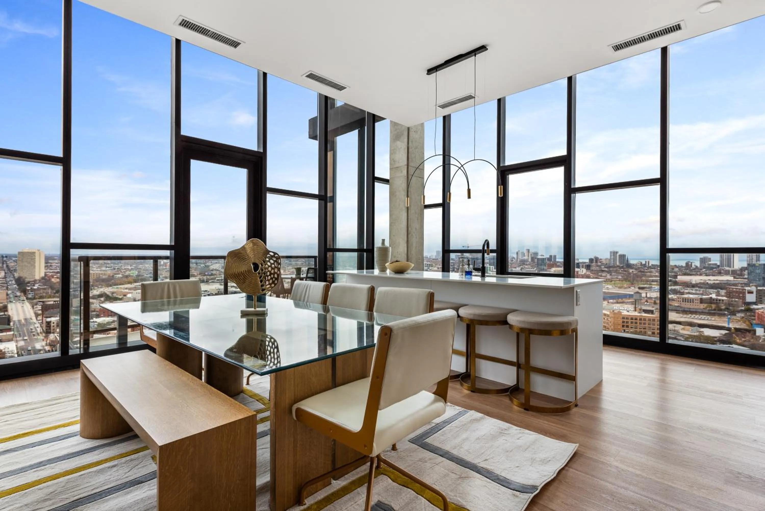 Dining area in Avenir West Loop Penthouses with Iconic City Views