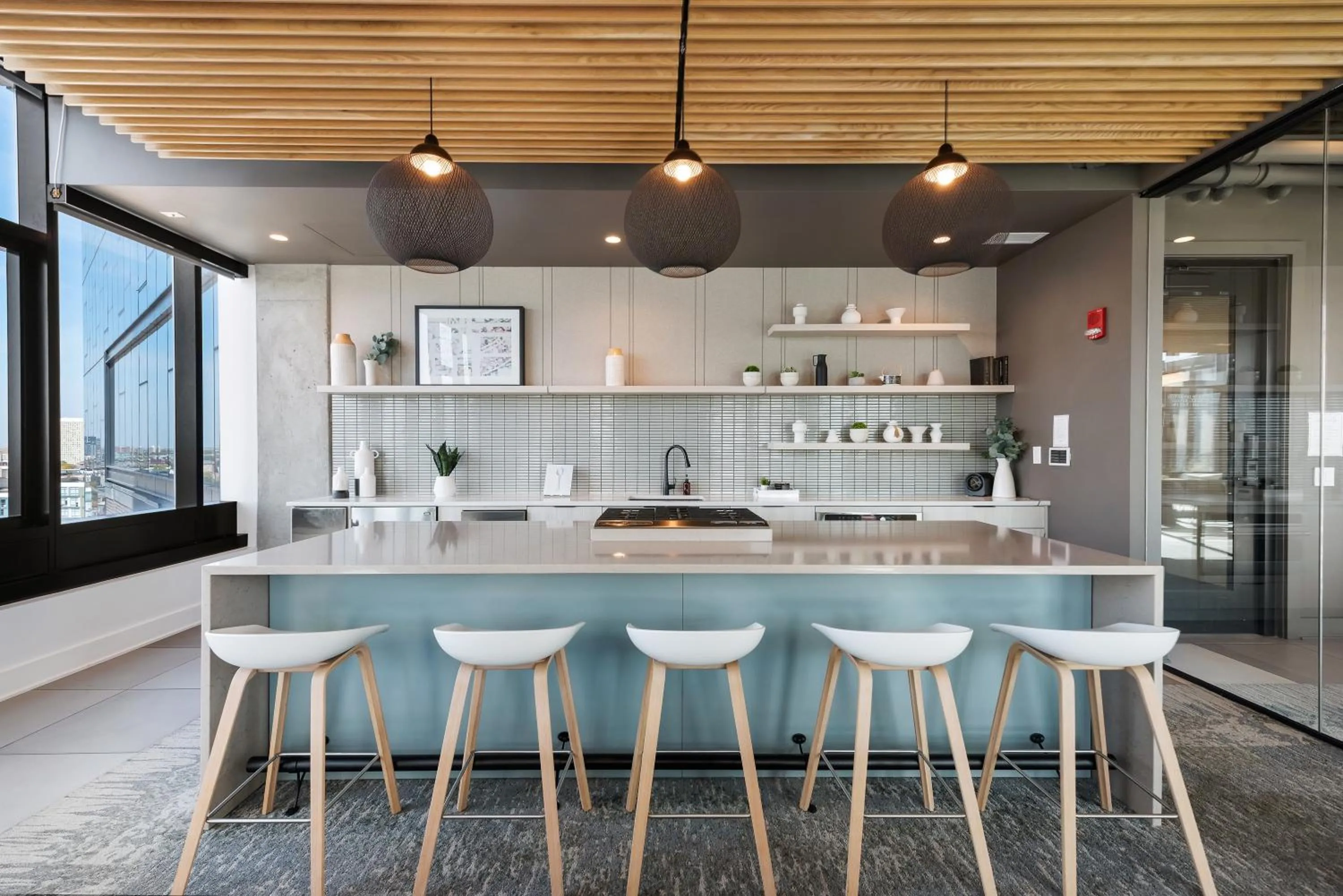 Communal kitchen in Avenir West Loop Penthouses with Iconic City Views