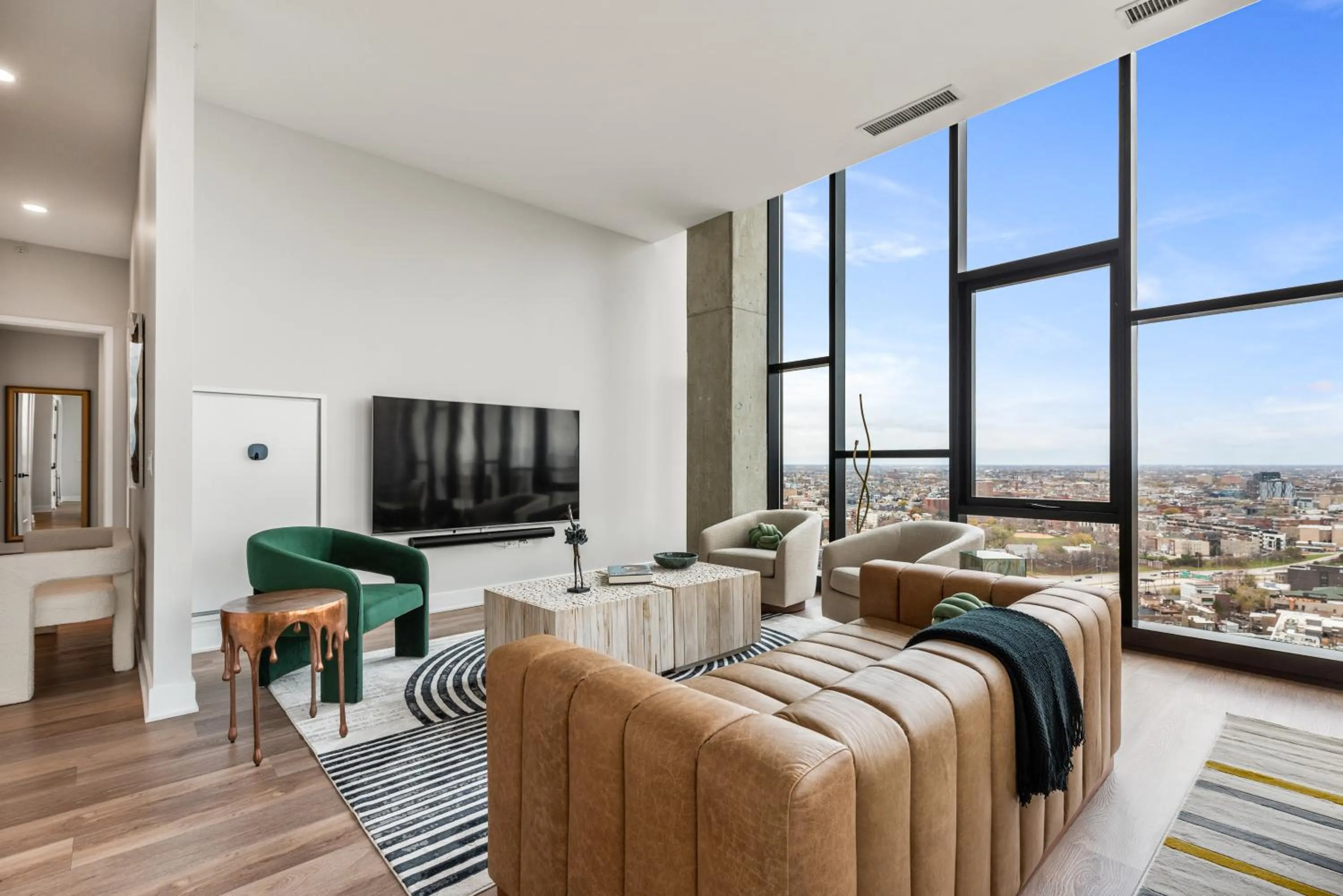TV and multimedia in Avenir West Loop Penthouses with Iconic City Views