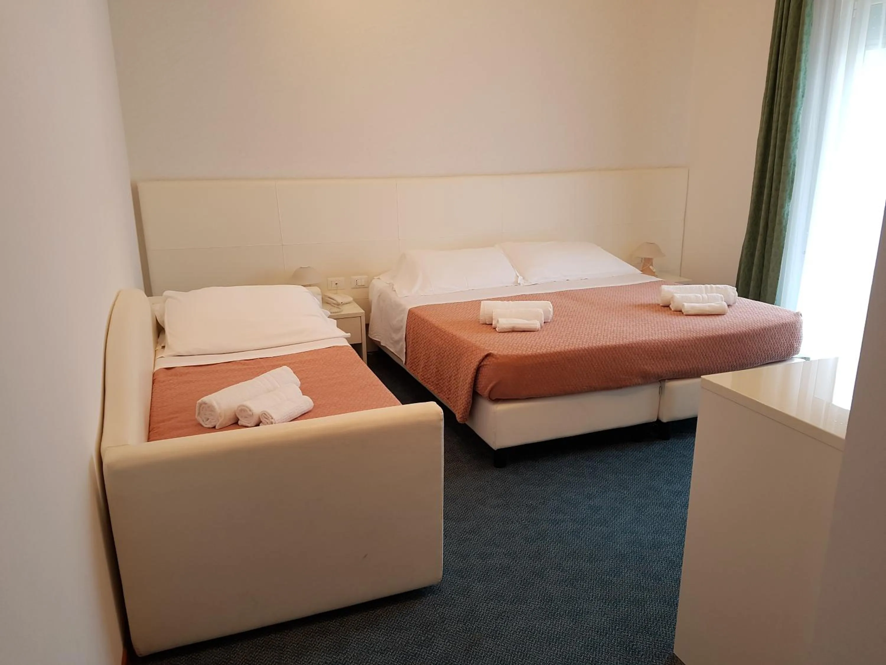 Bed in Hotel Sorriso