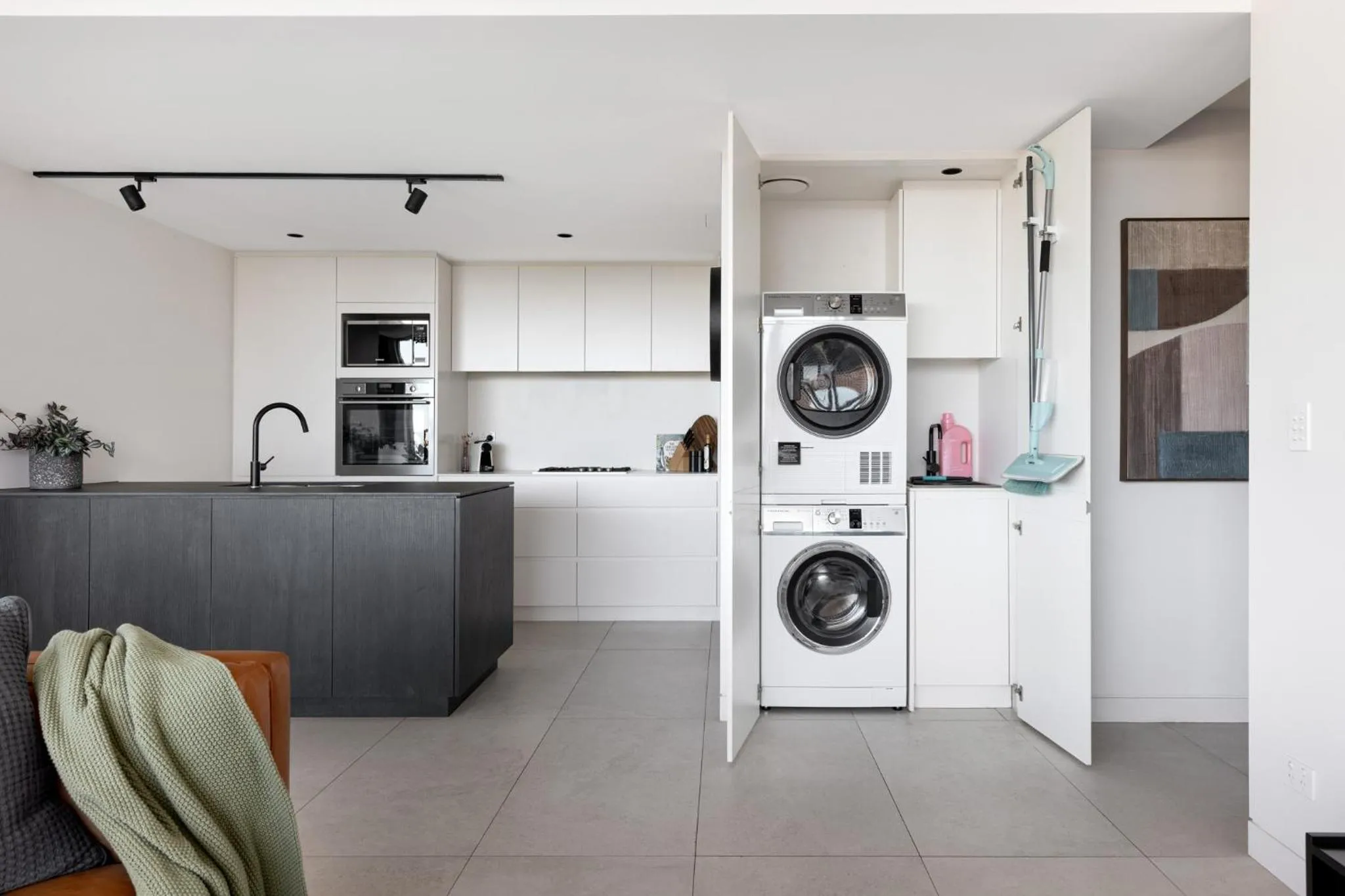 laundry in The Horizon Apartments by Urban Rest