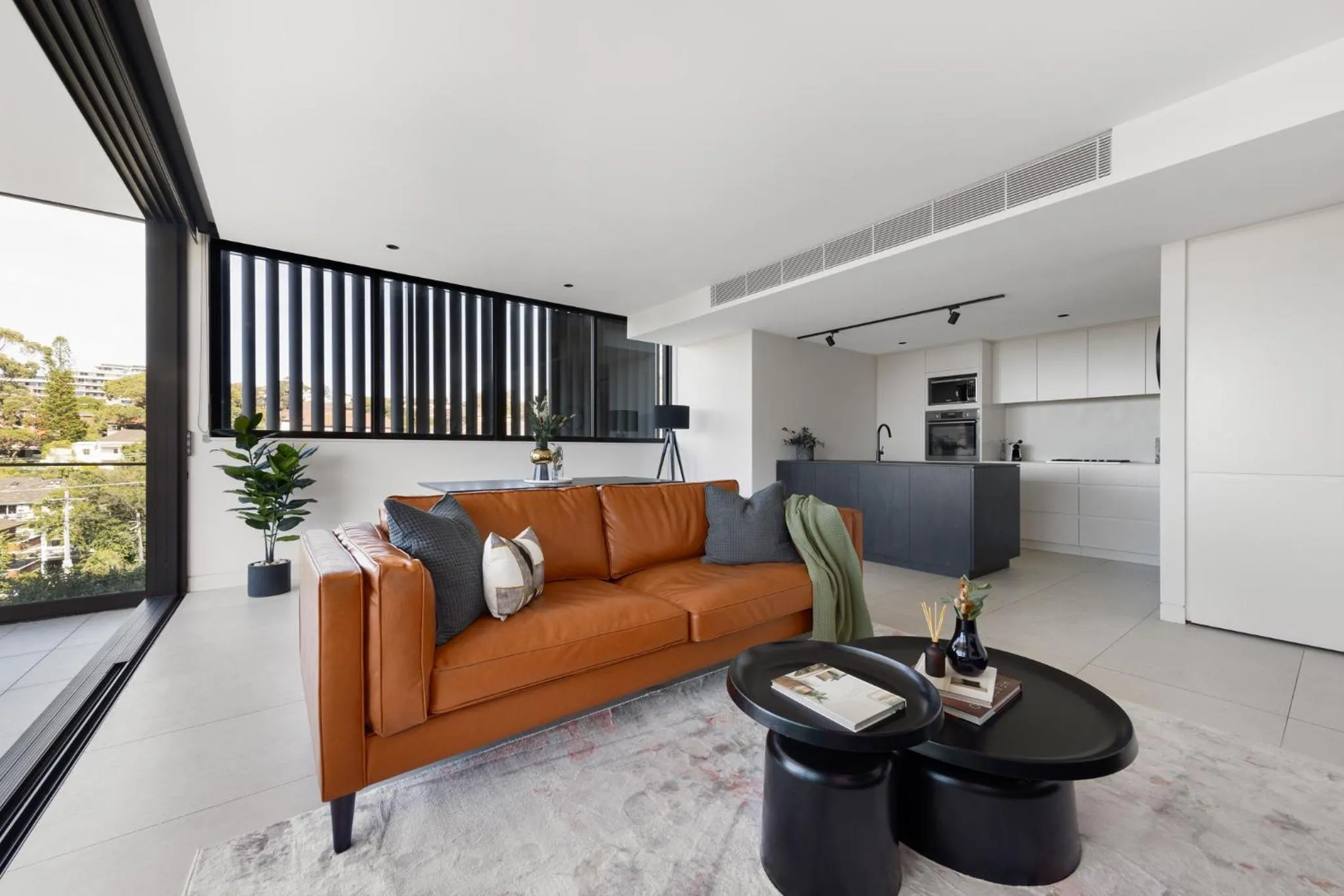 Living room in The Horizon Apartments by Urban Rest