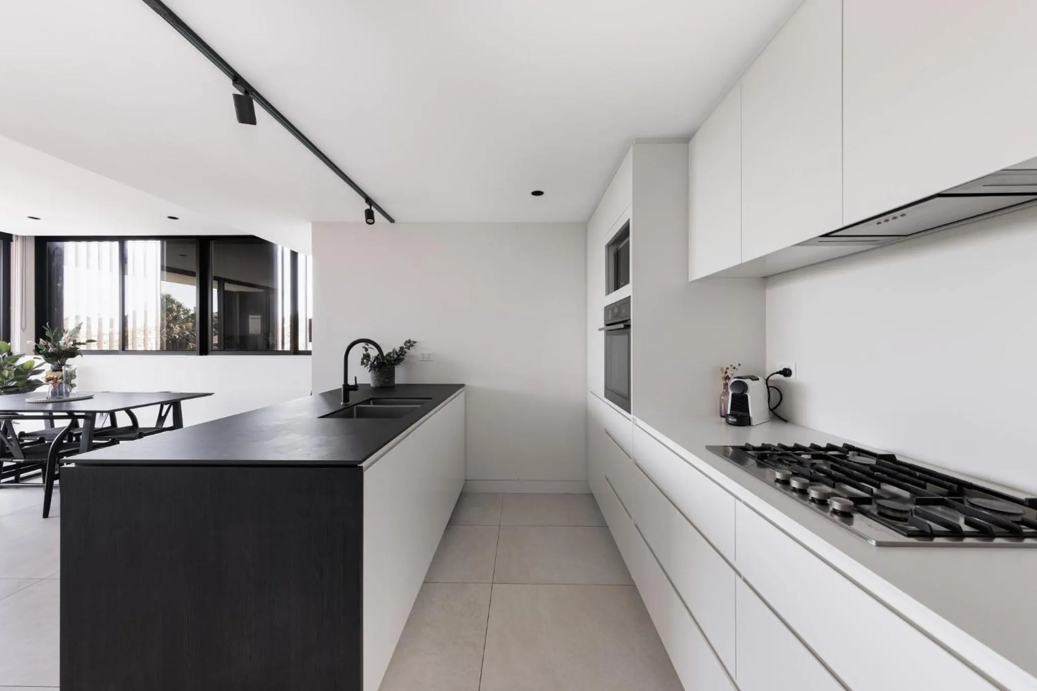 kitchen in The Horizon Apartments by Urban Rest