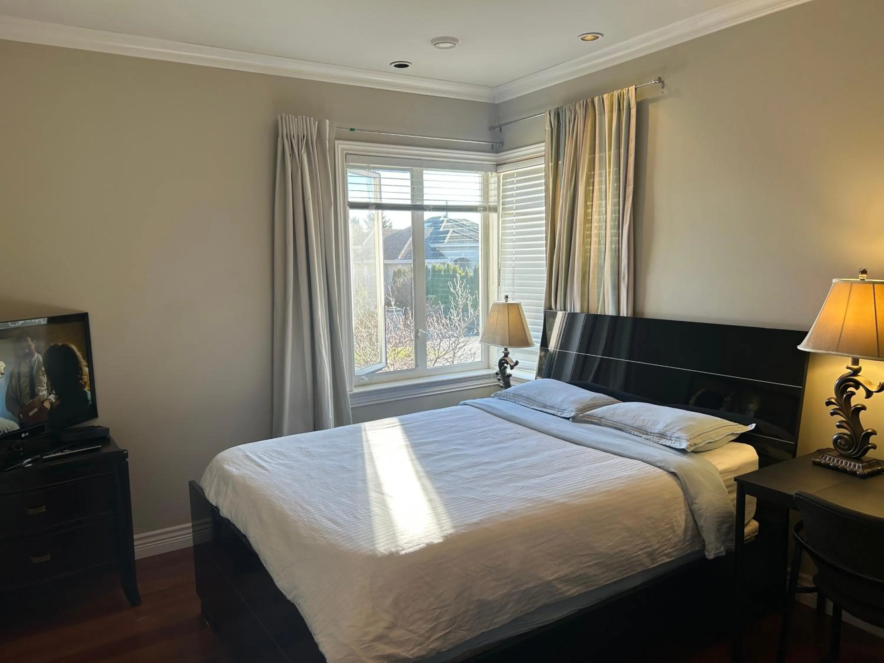 Bed in A cozy independent entrance bedroom with a private washroom close to YVR Richmond