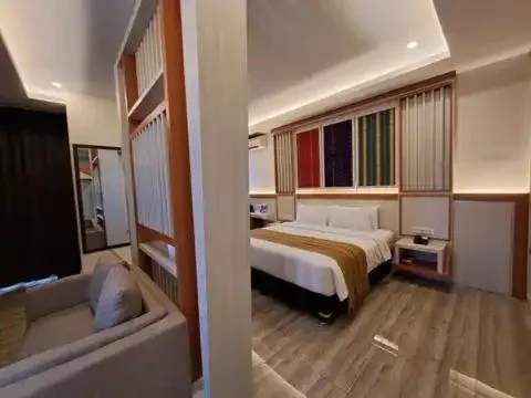 Bed in Hotel Simfony Alor