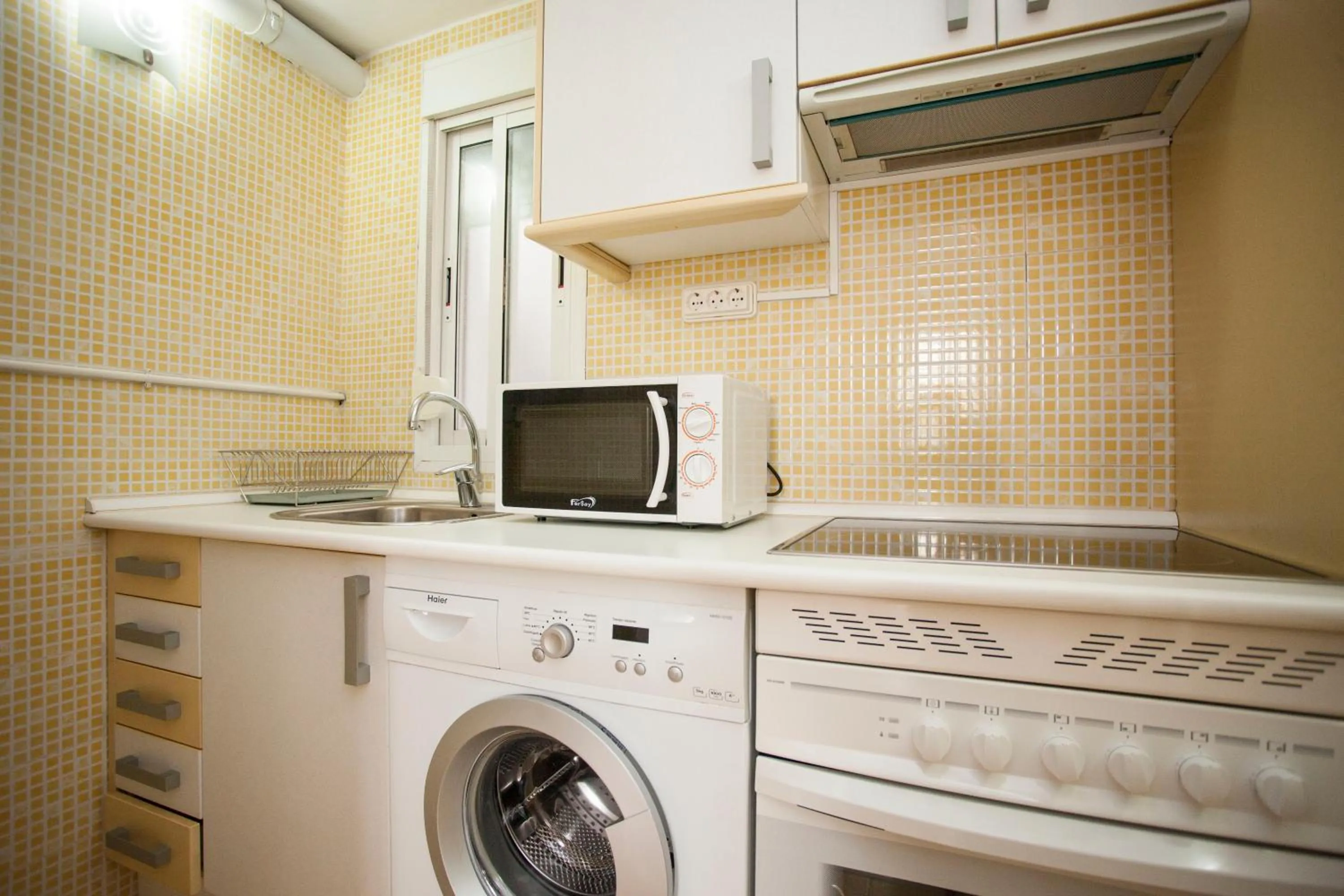 Kitchen or kitchenette in Fuencarral Apartments