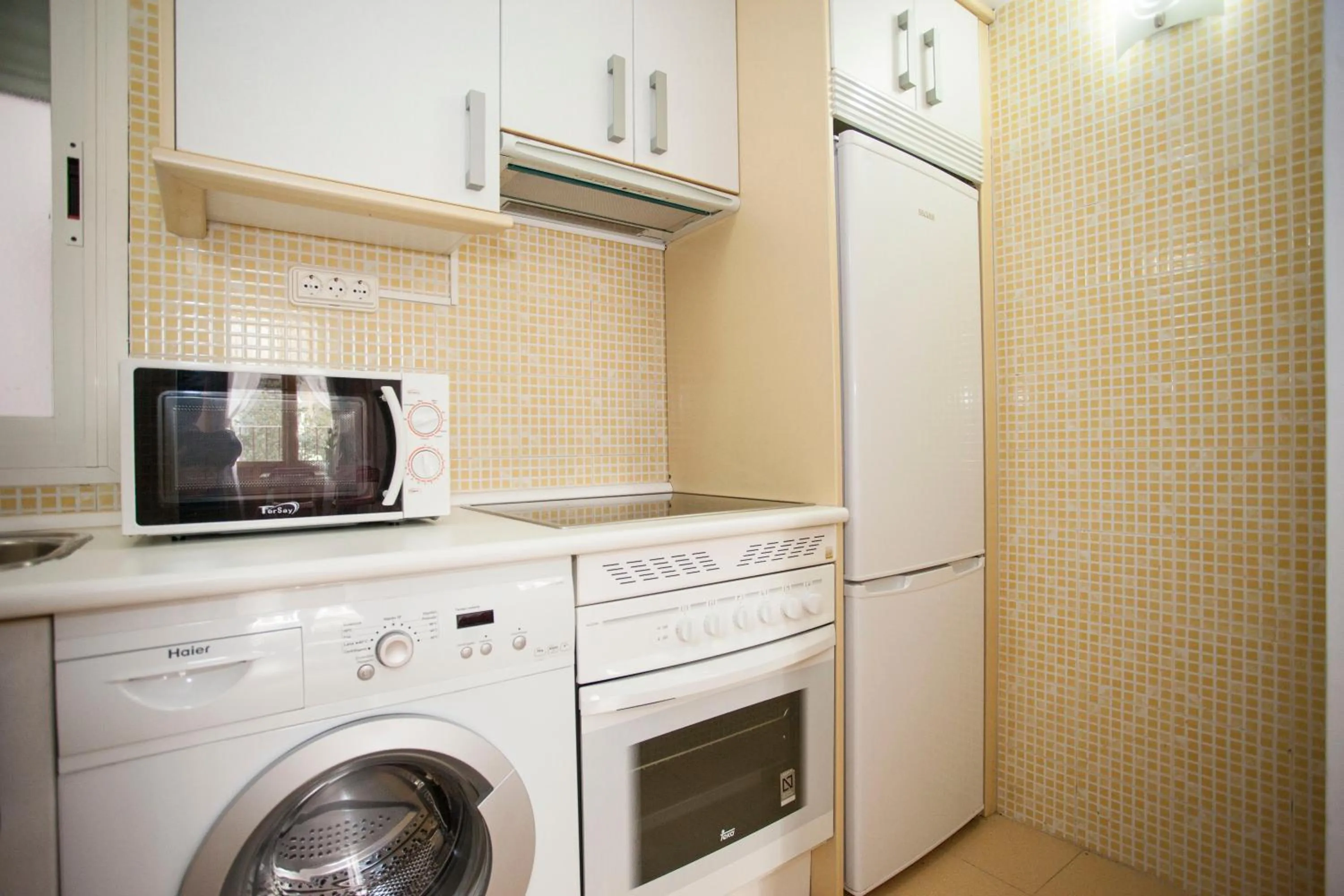 Kitchen or kitchenette in Fuencarral Apartments