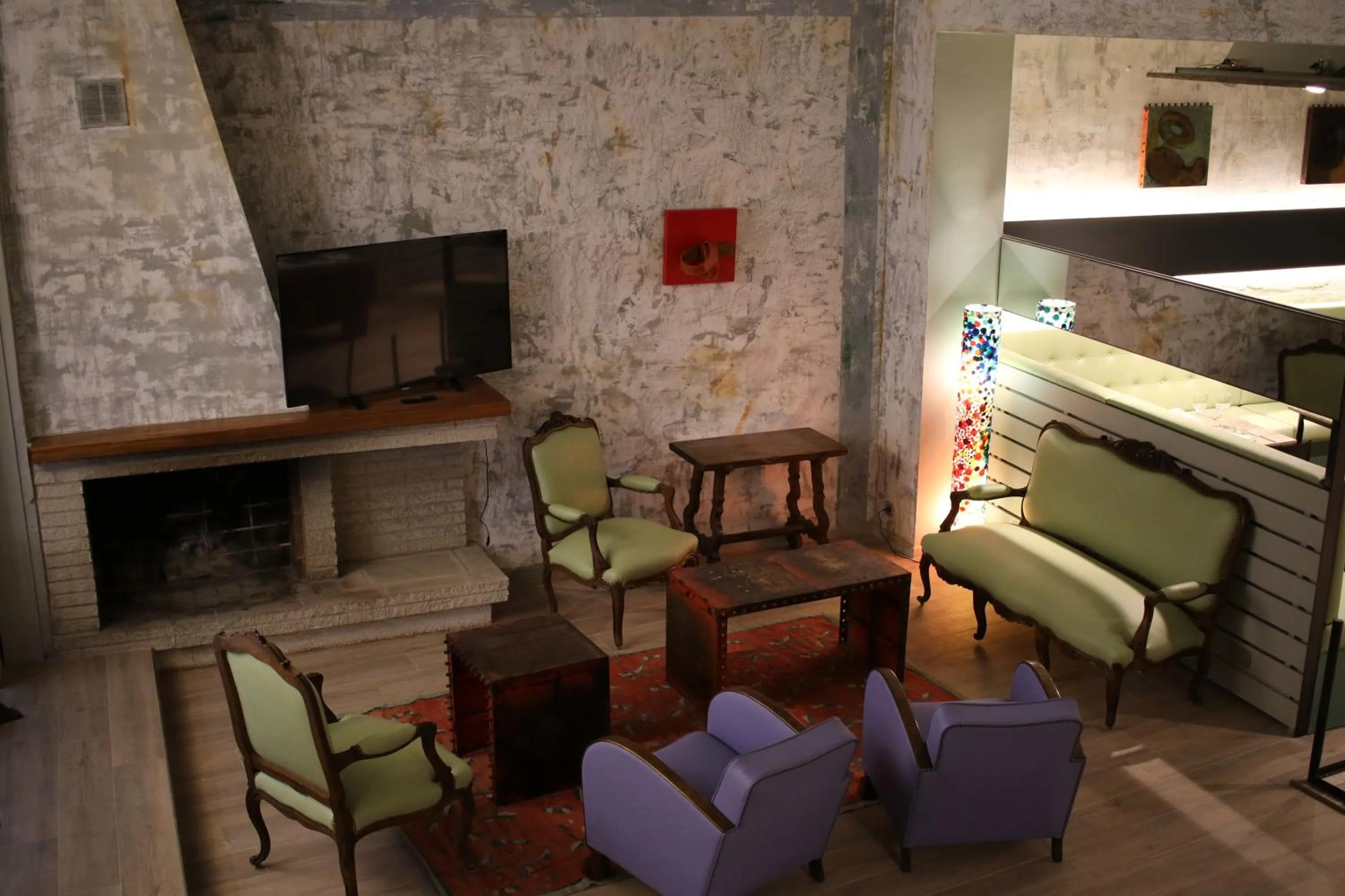 Communal lounge/ TV room in Hostal La Fosca
