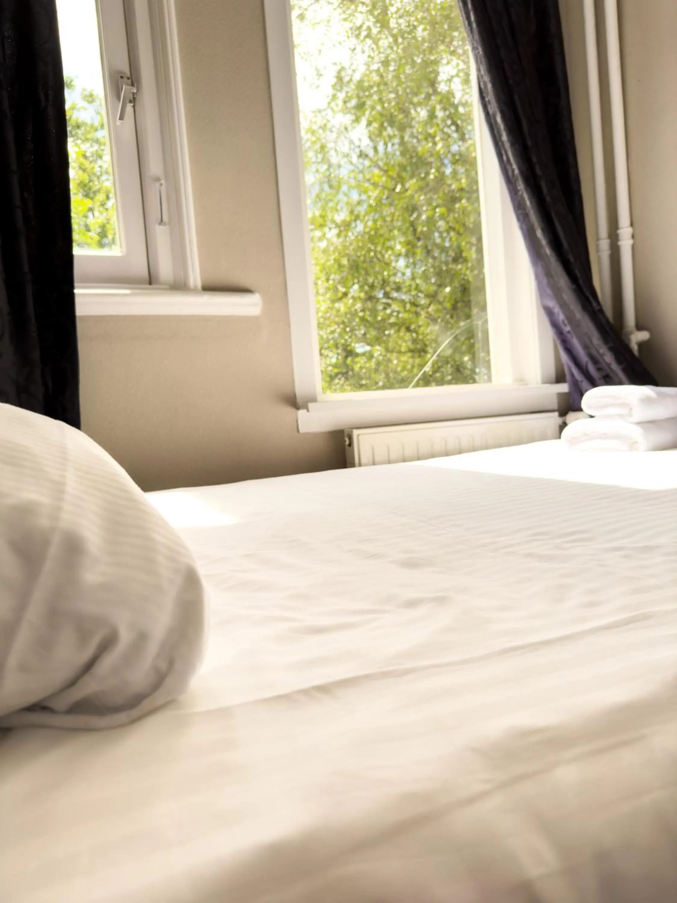 Bed in Hotel Vondel Garden