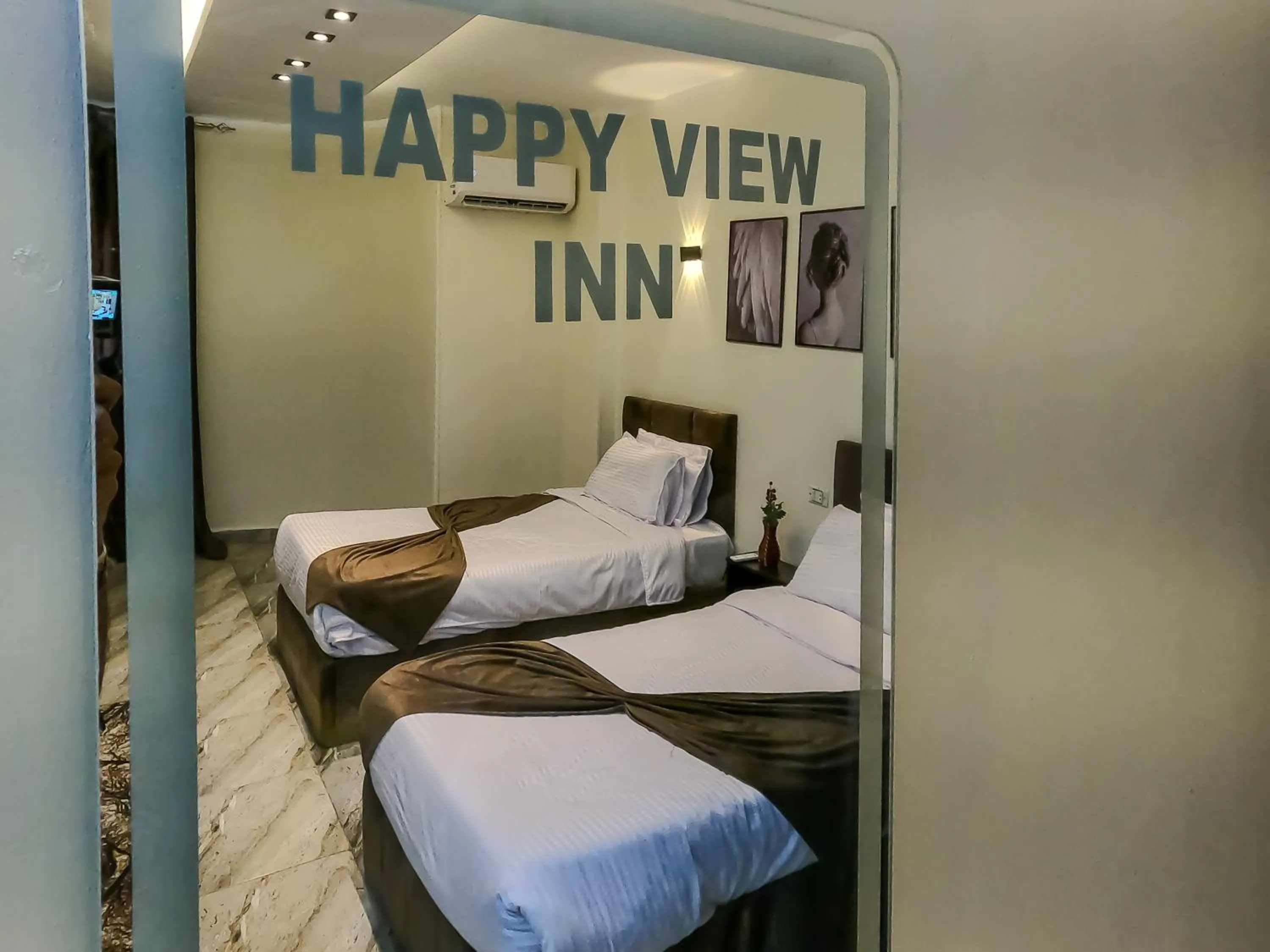 Bed in Happy View Inn