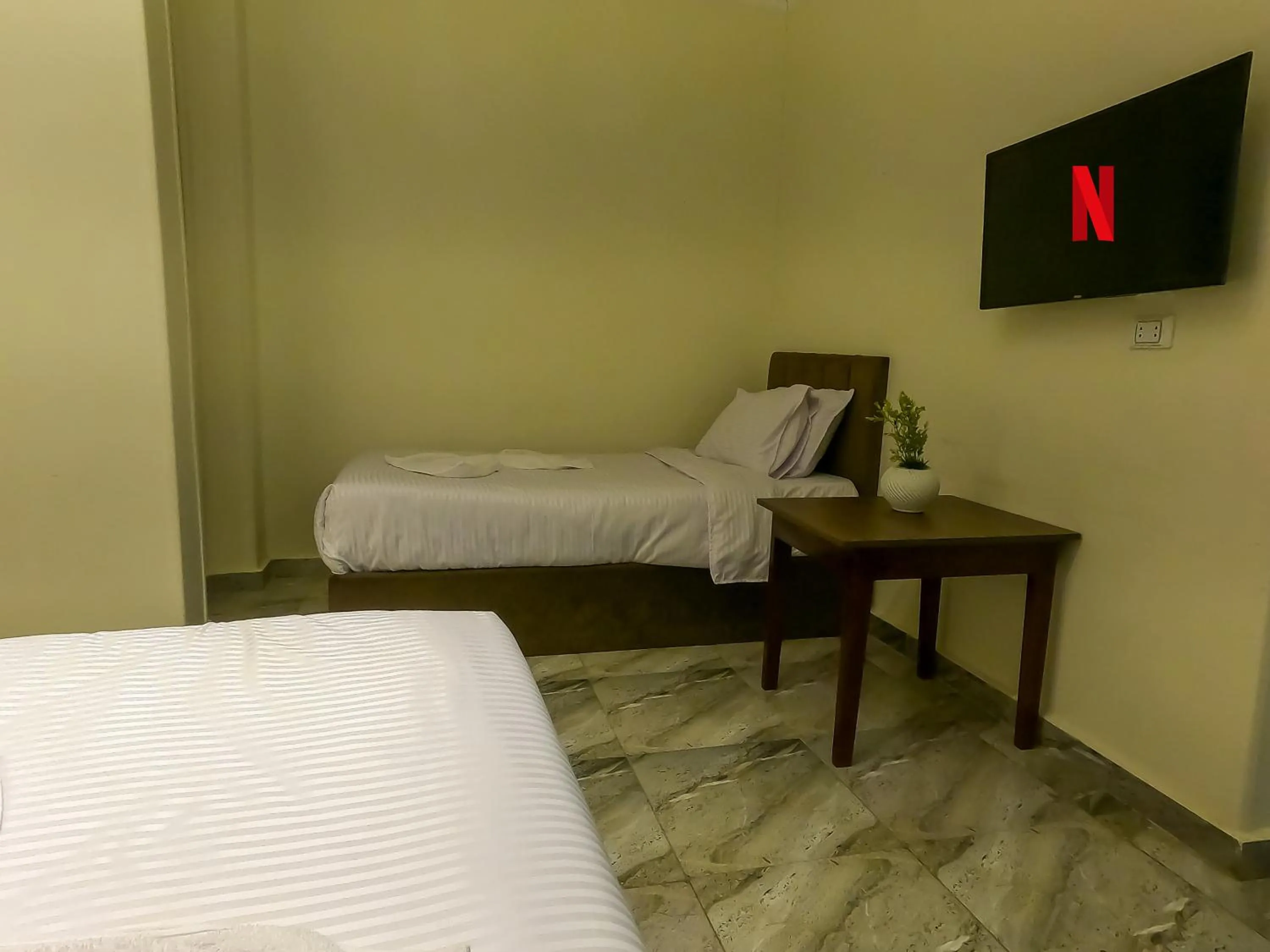 Bed in Happy View Inn