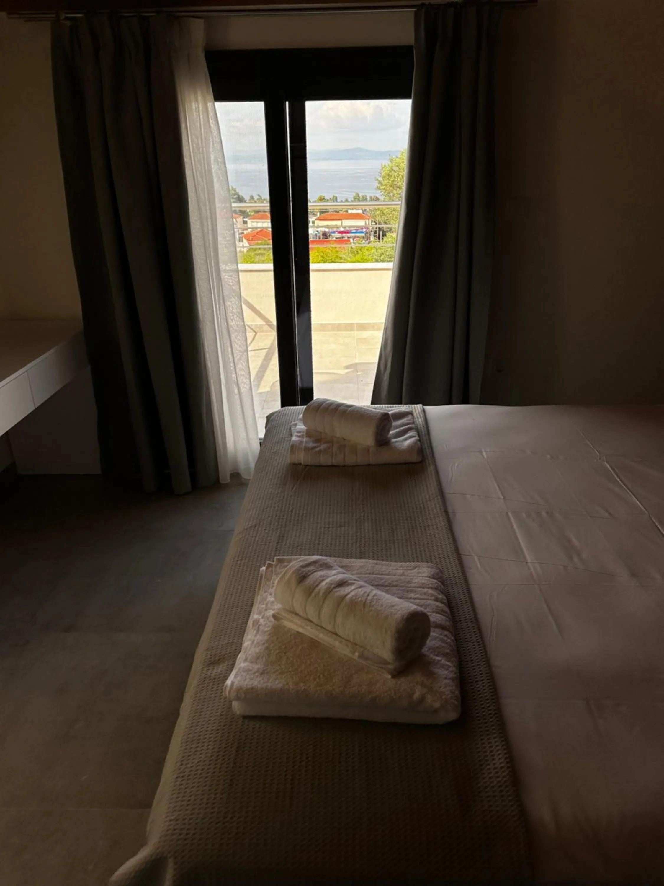 View (from property/room), Bed in Lighthouse Apartments