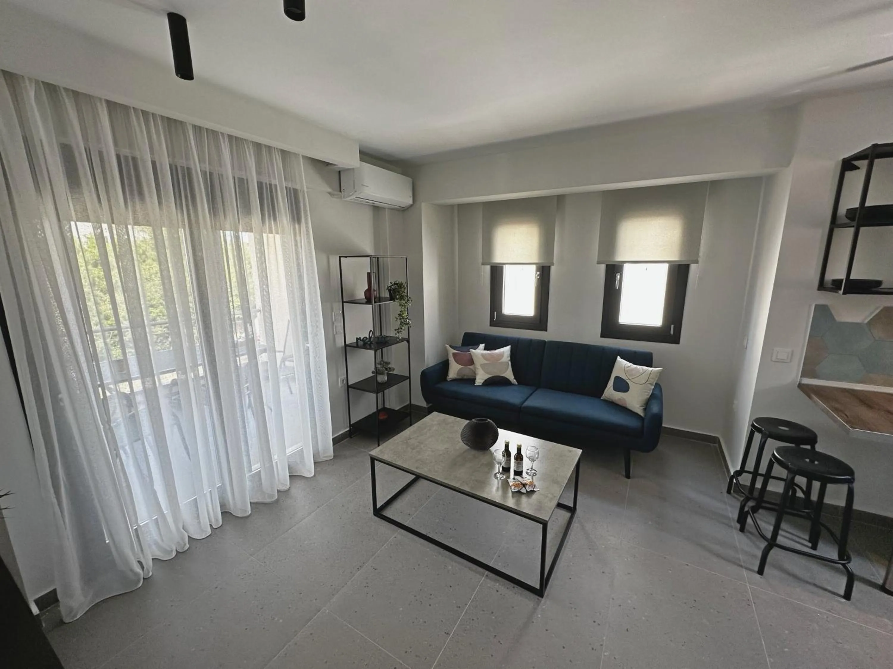 Living room, Bed in Lighthouse Apartments