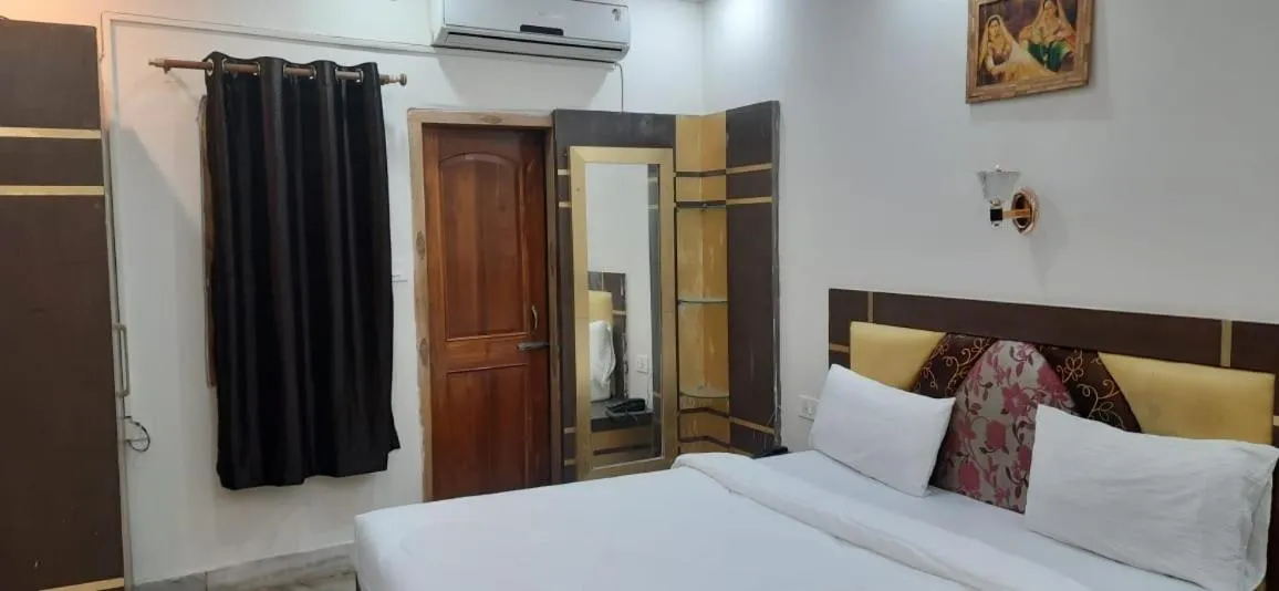 Bed in ROYAL CHETAN INN