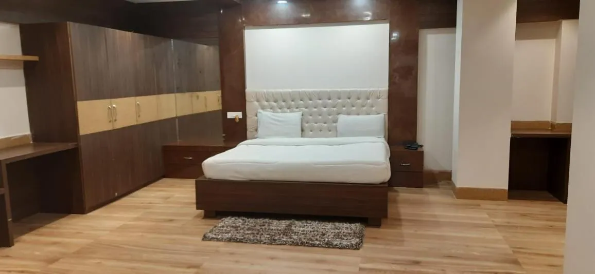 Bed in ROYAL CHETAN INN