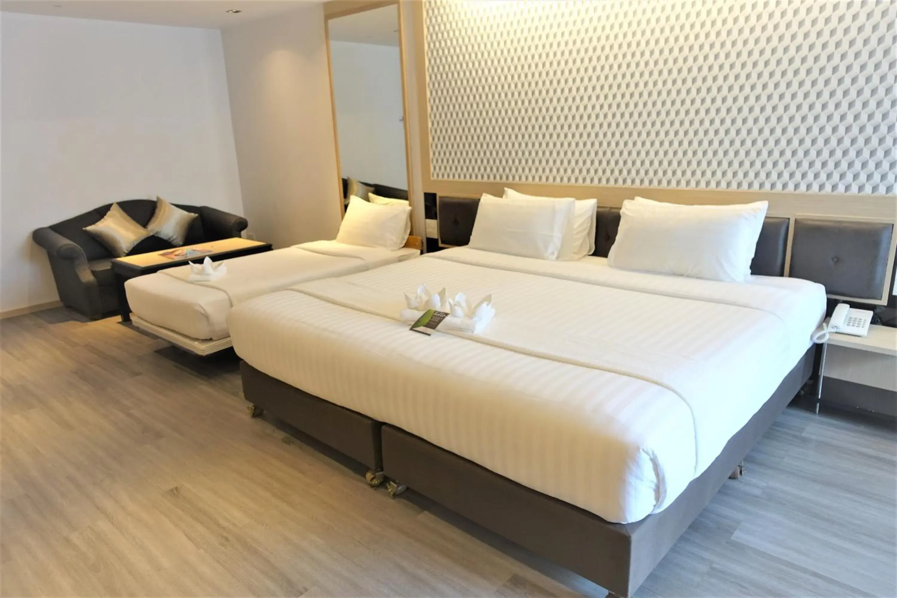 Bedroom, Bed in Three Sukhumvit Hotel - SHA Plus Certified Bedroom, Bed in Three Sukhumvit Hotel - SHA Plus Certified