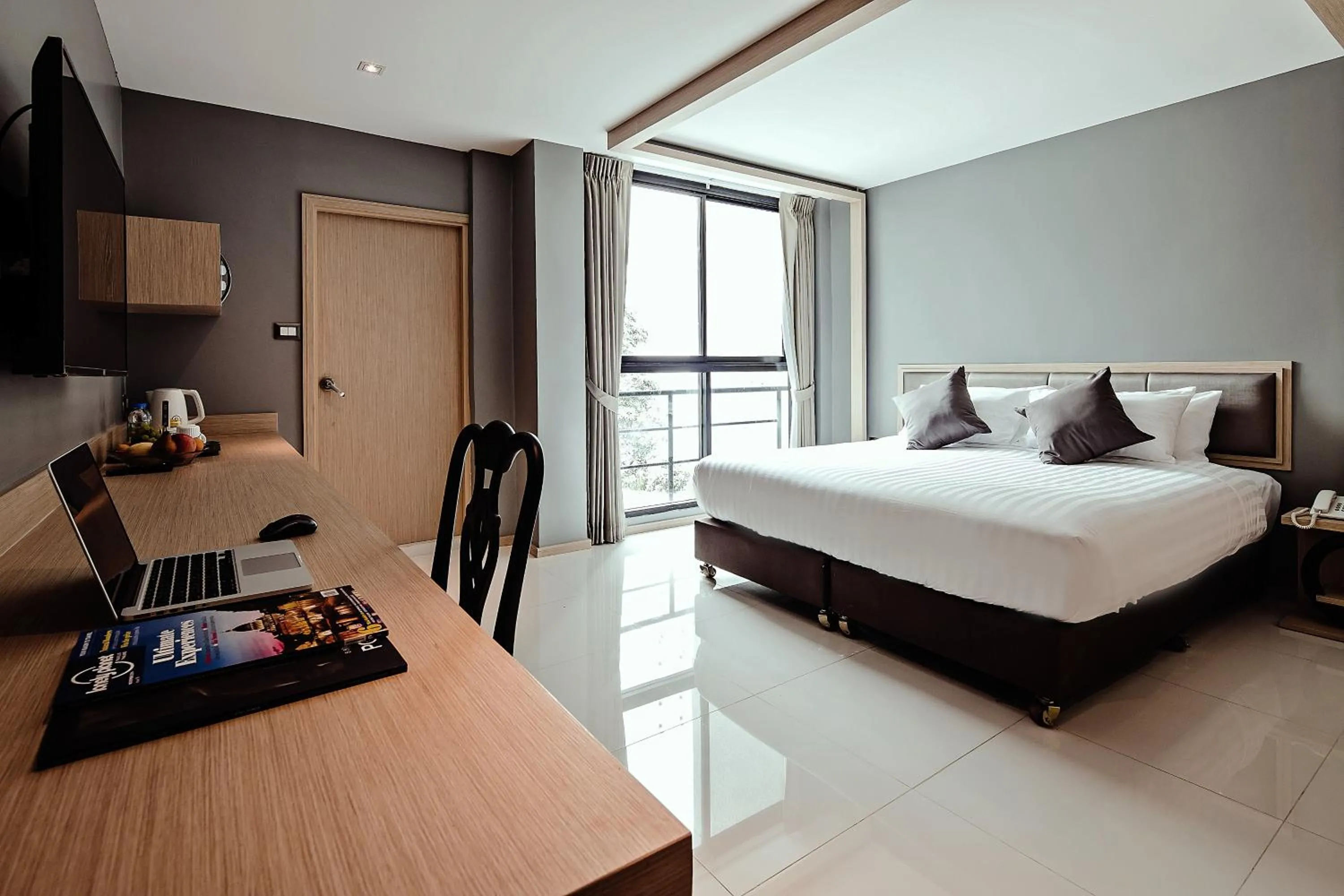 Photo of the whole room, Bed in Three Sukhumvit Hotel - SHA Plus Certified