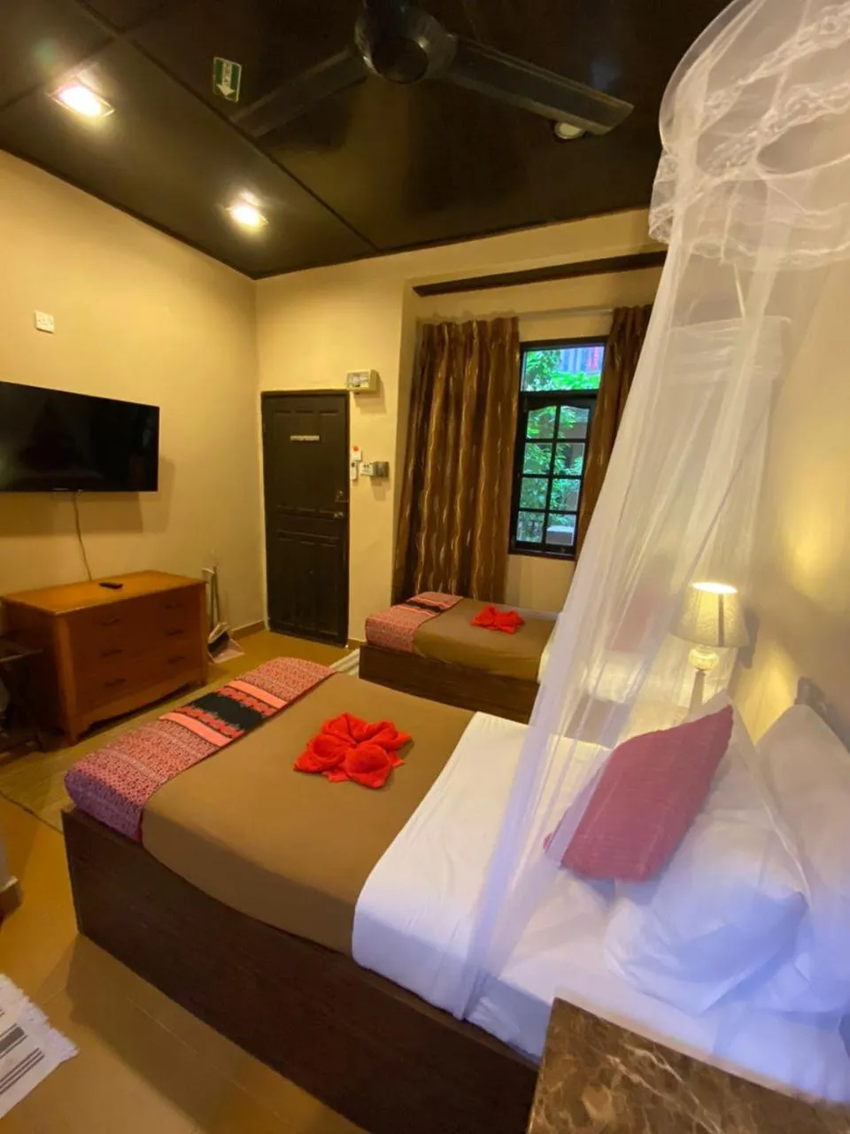 Bed in Ombak Dive Resort Perhentian Island