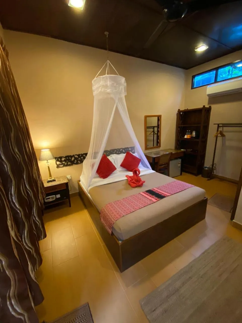 Bed in Ombak Dive Resort Perhentian Island