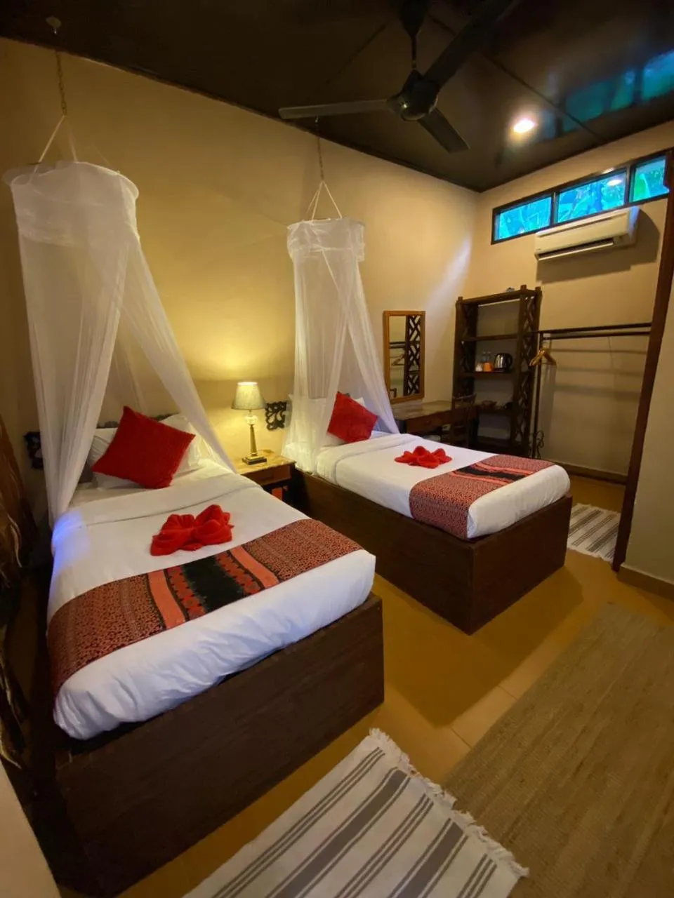 Bed in Ombak Dive Resort Perhentian Island