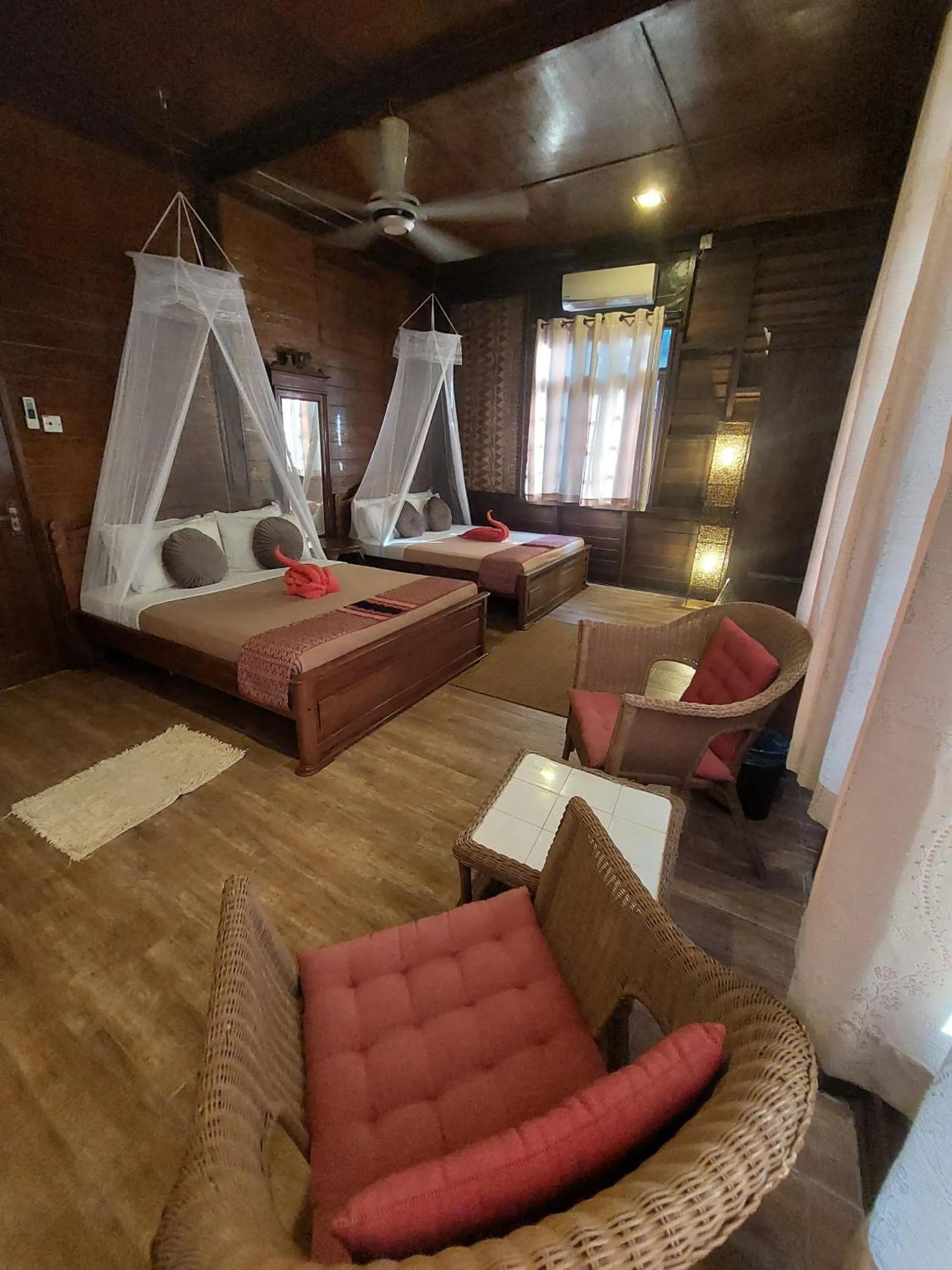 Bed in Ombak Dive Resort Perhentian Island