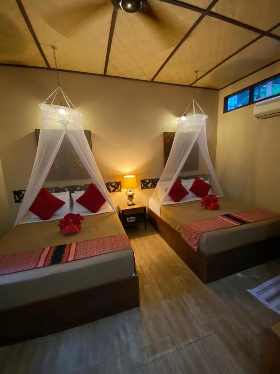 Bed in Ombak Dive Resort Perhentian Island