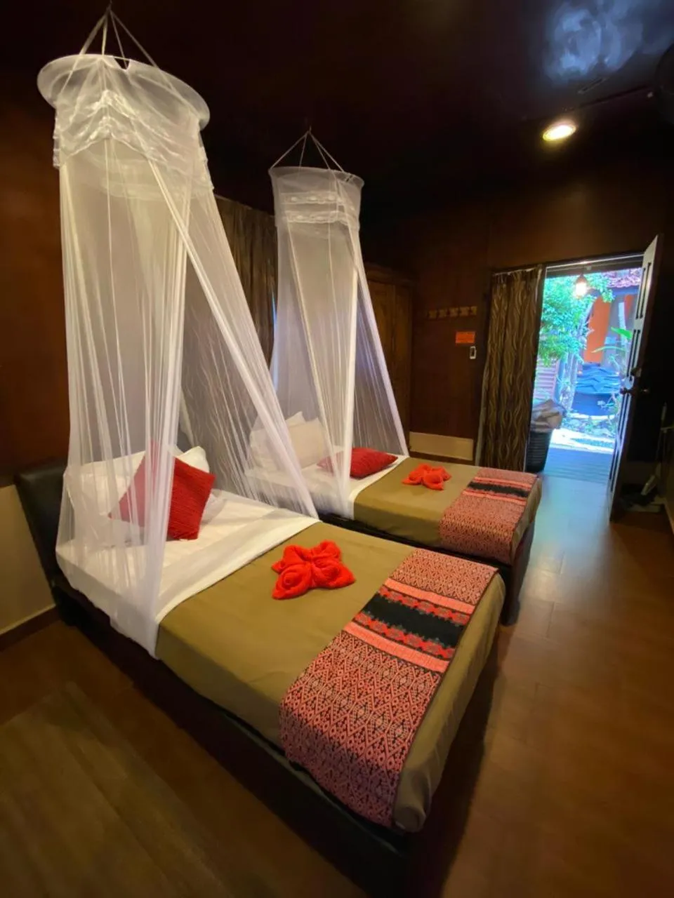 Bed in Ombak Dive Resort Perhentian Island