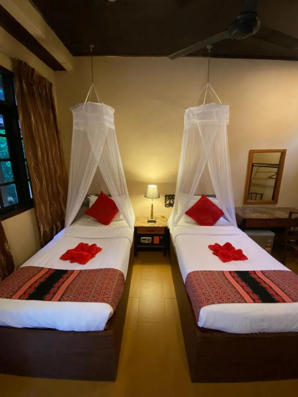 Bed in Ombak Dive Resort Perhentian Island