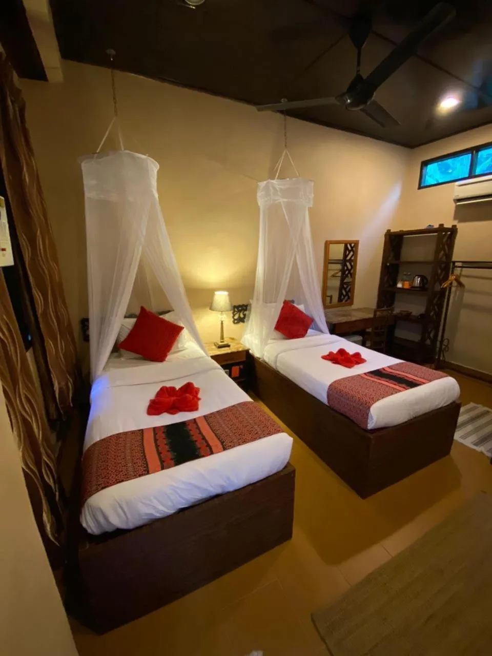 Bed in Ombak Dive Resort Perhentian Island