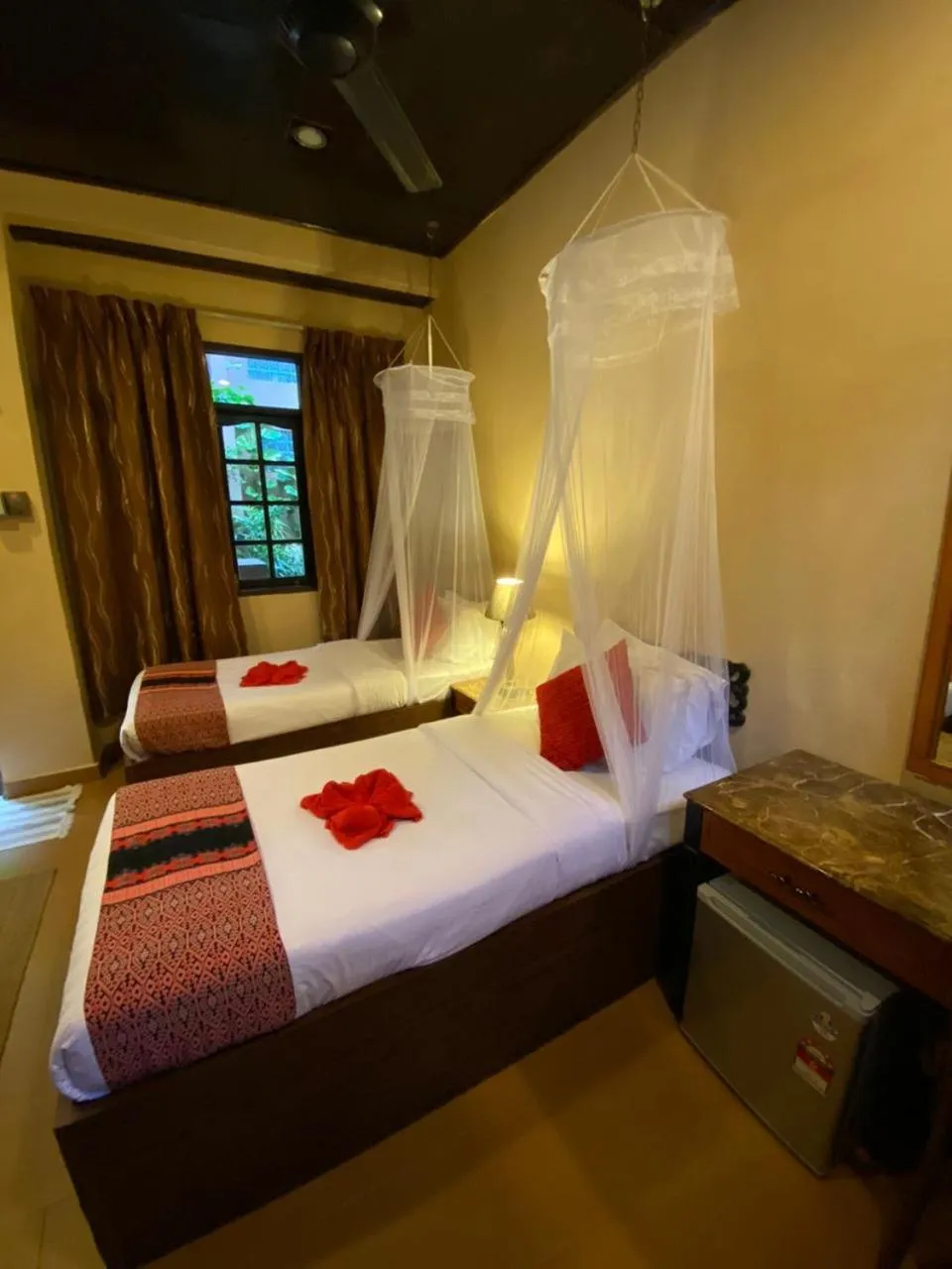 Bed in Ombak Dive Resort Perhentian Island