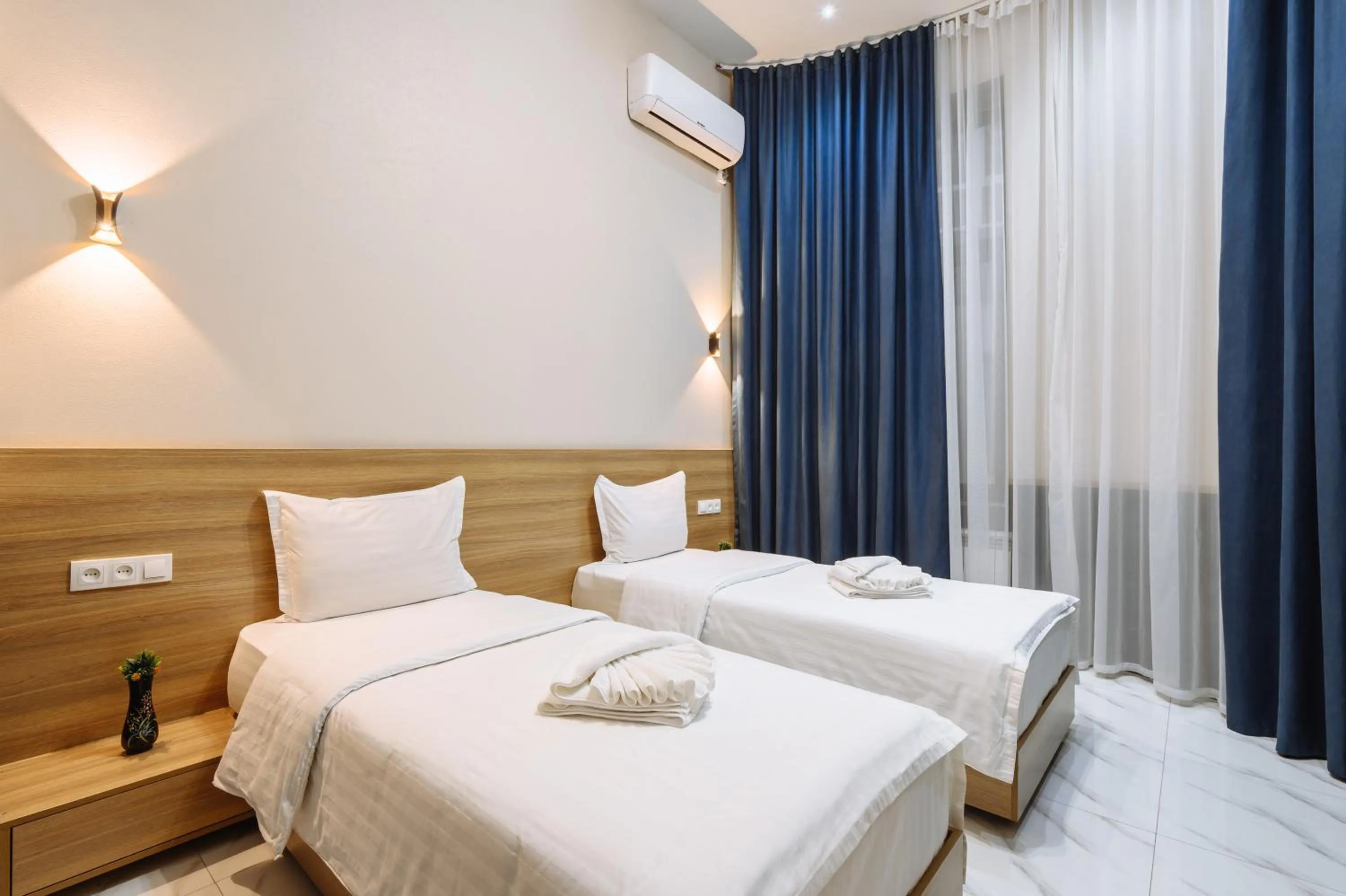 Bed in Sofiya Tashkent Hotel