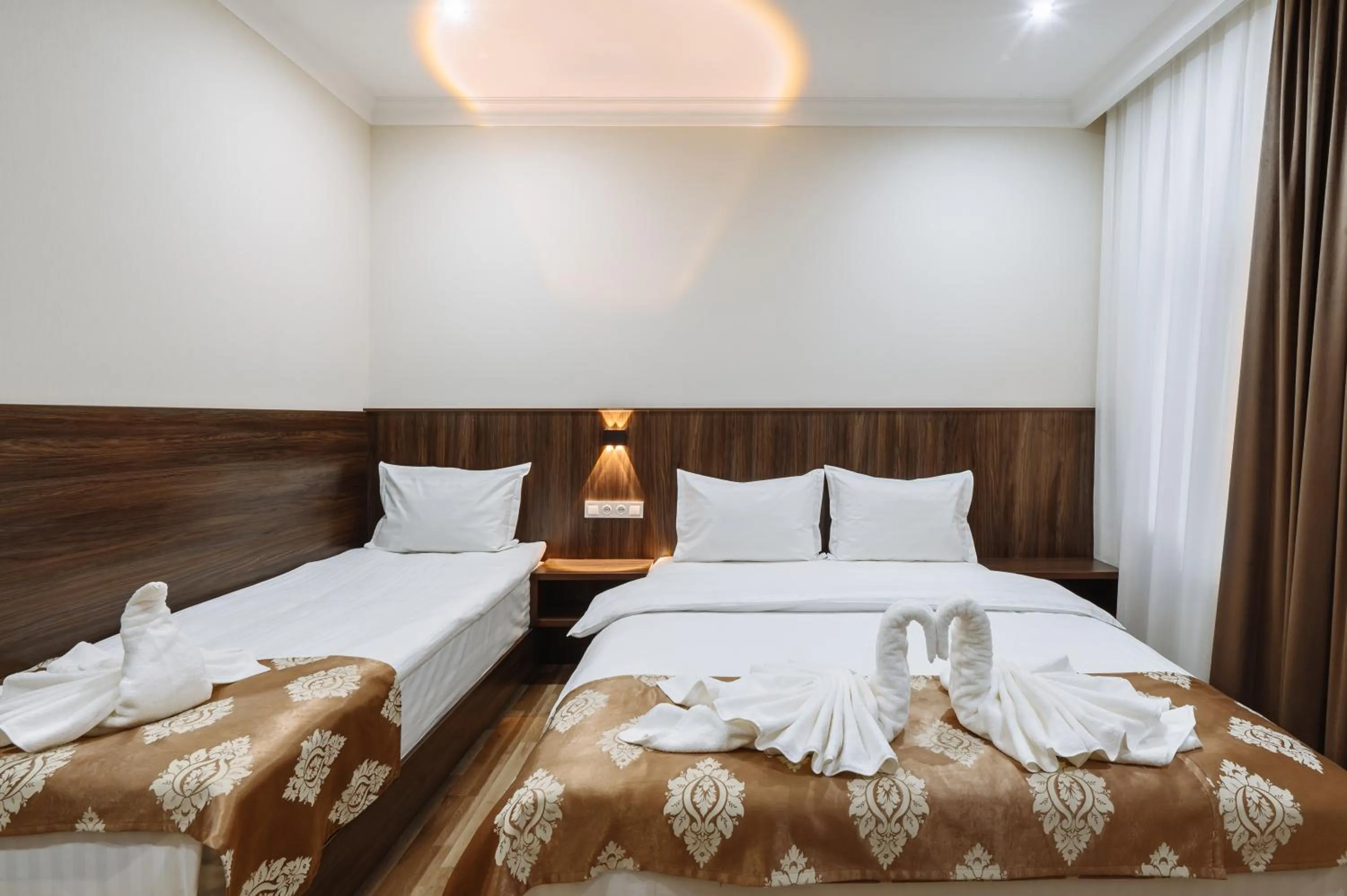 Bed in Sofiya Tashkent Hotel