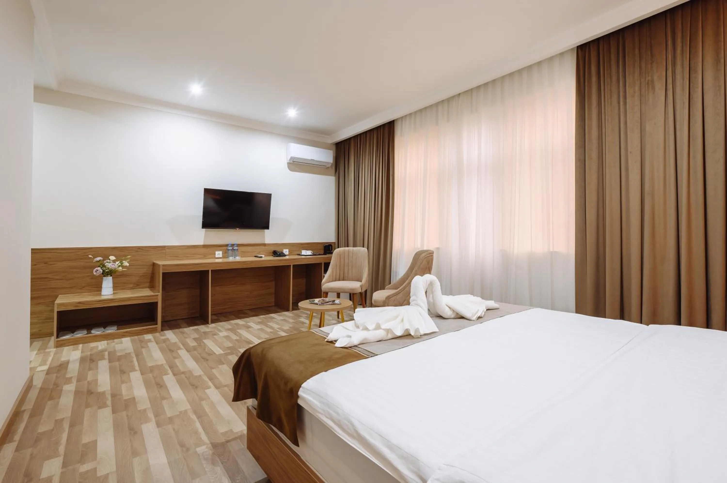 TV and multimedia, Bed in Sofiya Tashkent Hotel