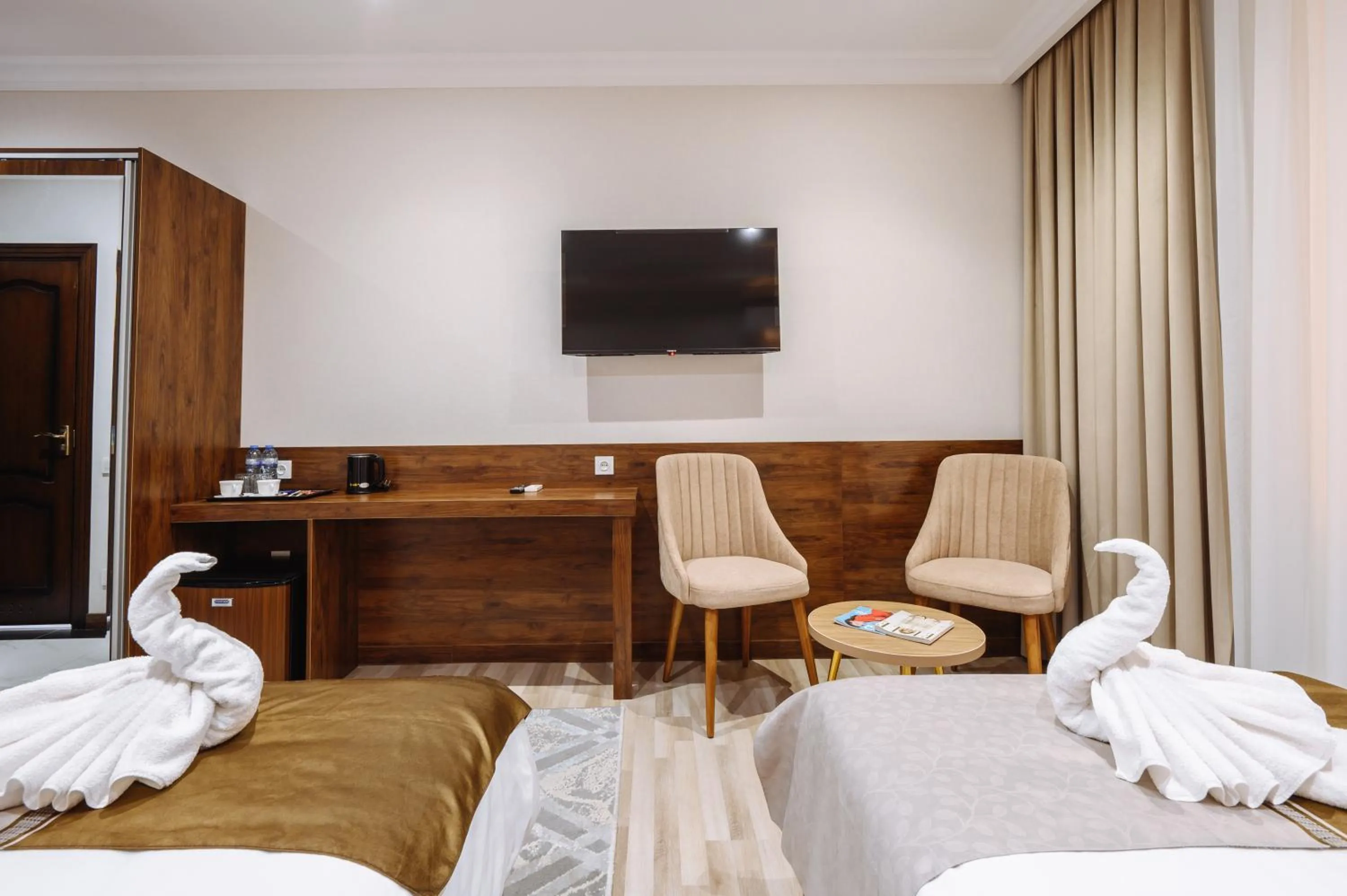 Bed in Sofiya Tashkent Hotel