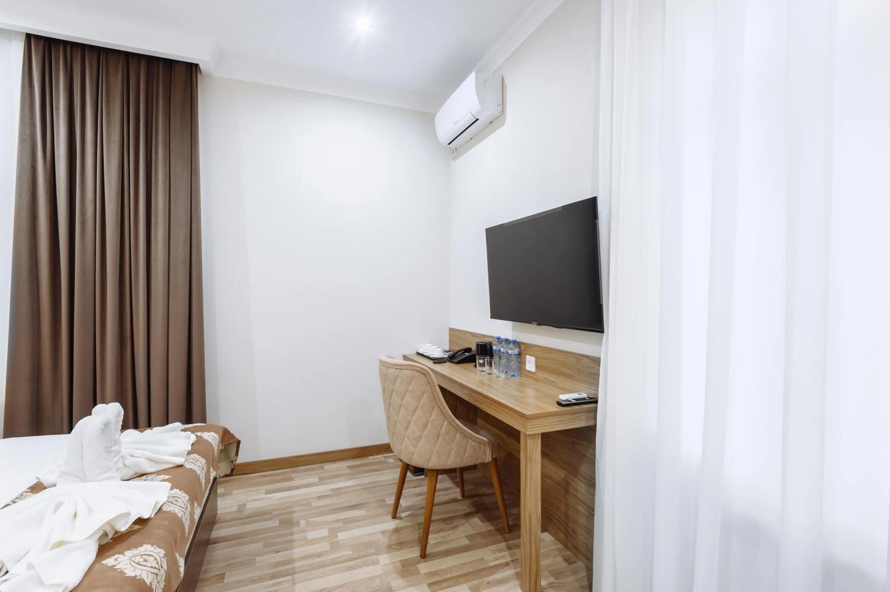 TV and multimedia, Bed in Sofiya Tashkent Hotel