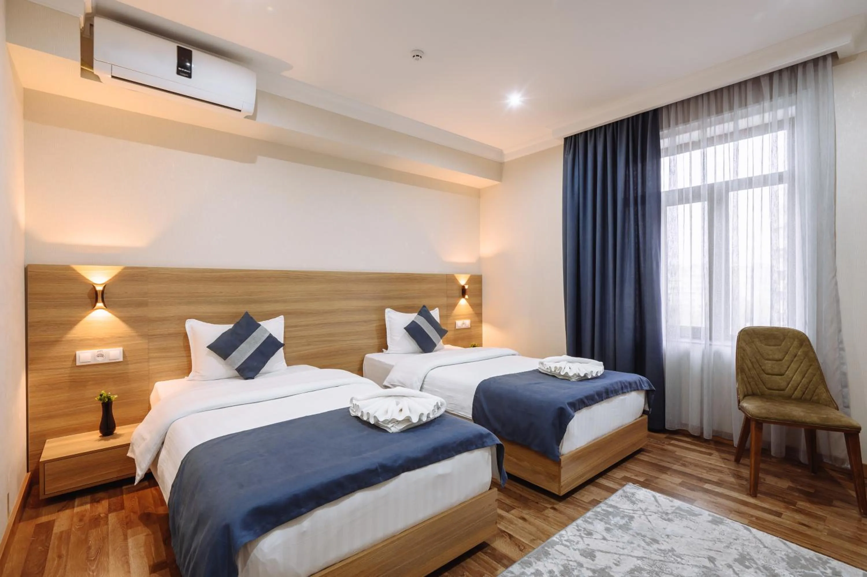 Bed in Sofiya Tashkent Hotel