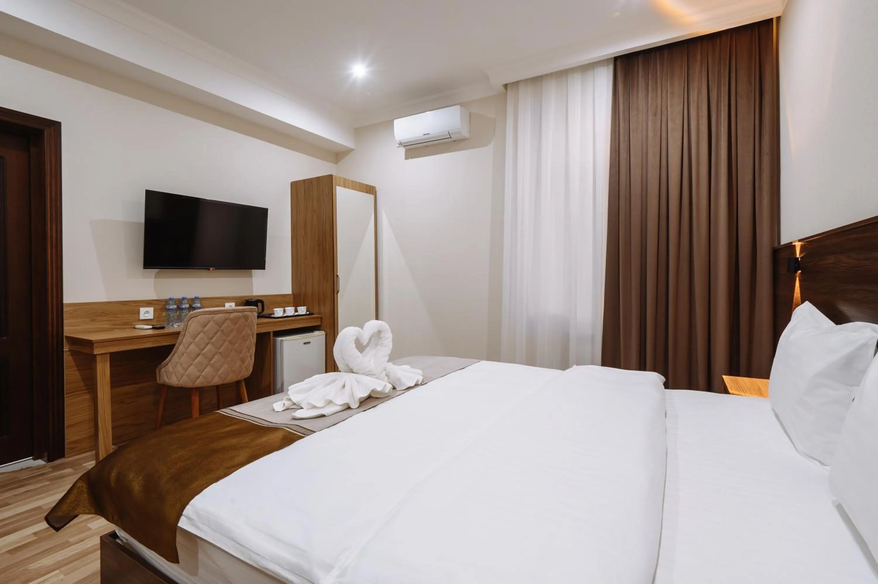 TV and multimedia, Bed in Sofiya Tashkent Hotel