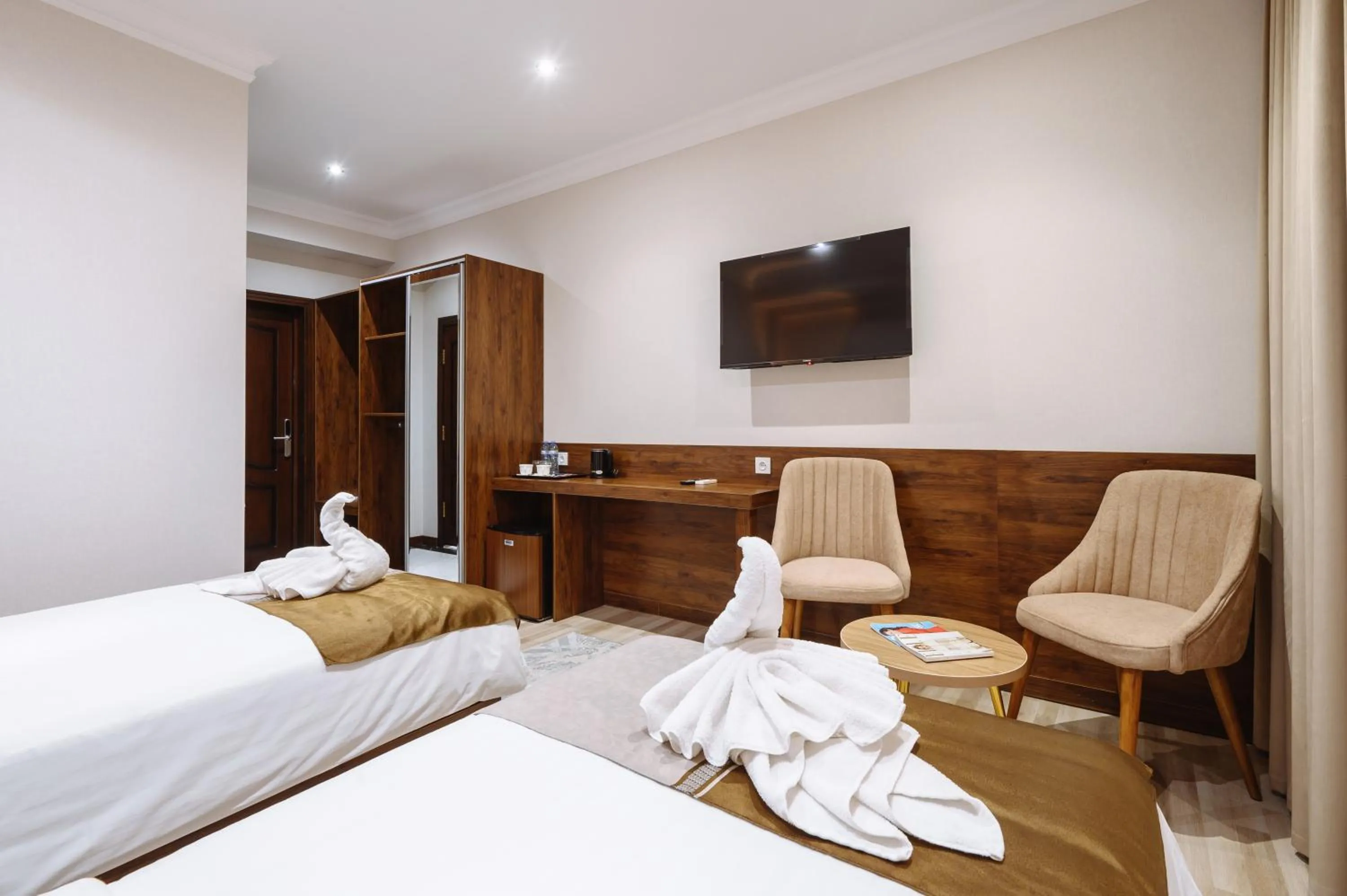 TV and multimedia, Bed in Sofiya Tashkent Hotel